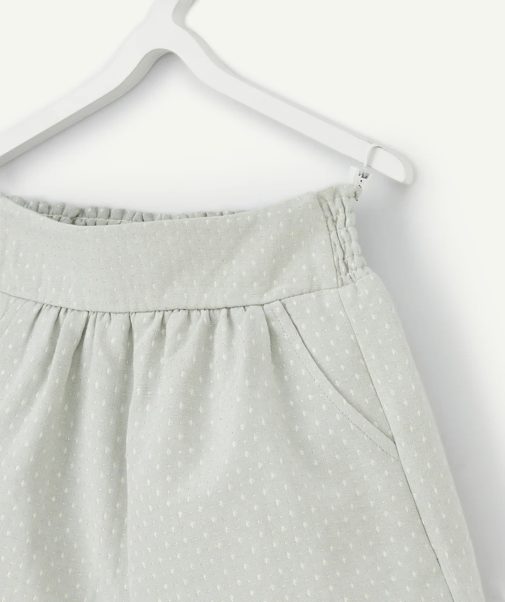 SHORT FILLE VERT AVEC SURPIQÛRES COULEUR DORÉE