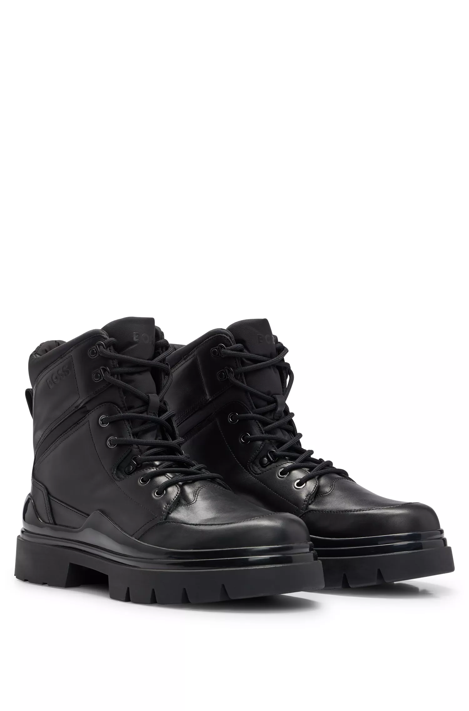 Botas de cano curto BOSS pretas e robustas em couro com detalhes do logotipo.