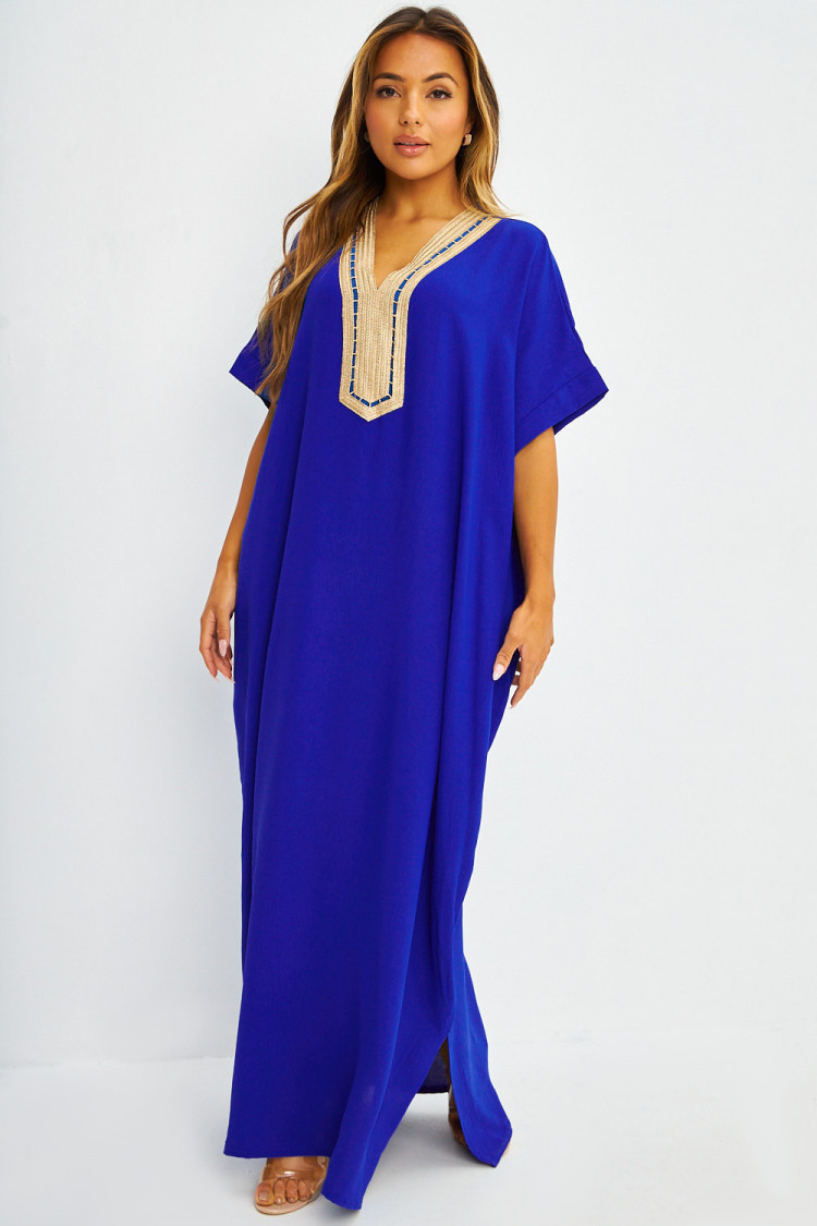 Abaya bleue à broderies dorées