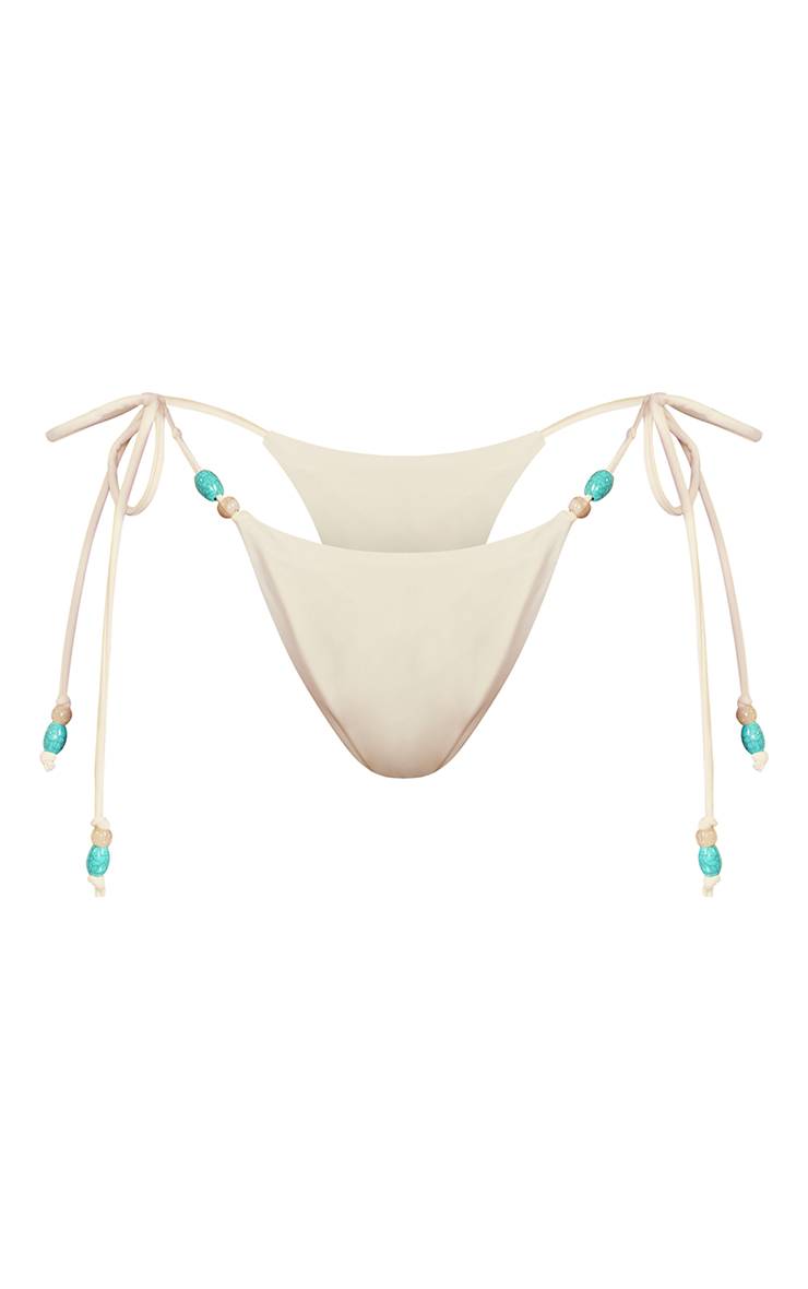 Crème Bas De Bikini À Nouer Sur Les Côtés Avec Perles Décoratives Et Coloris Turquoise