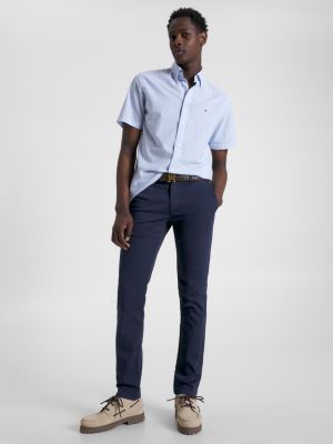 Calças chino slim fit tingidas em peça da Bleecker