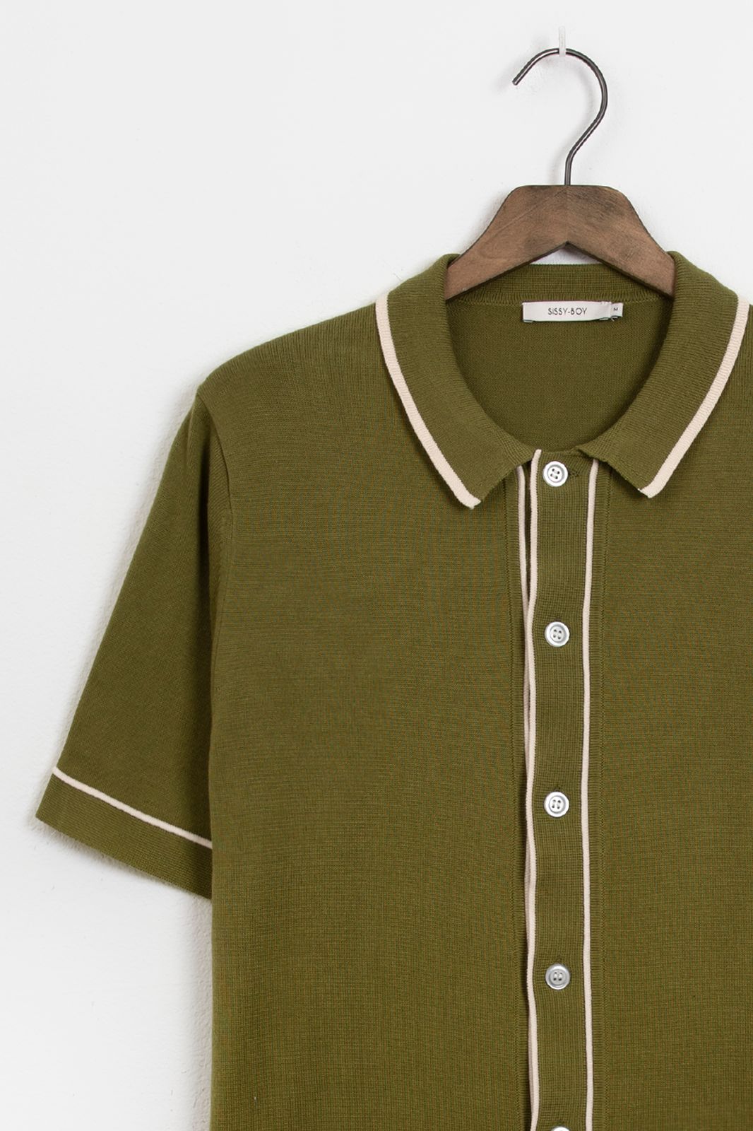 Groene gebreide polo