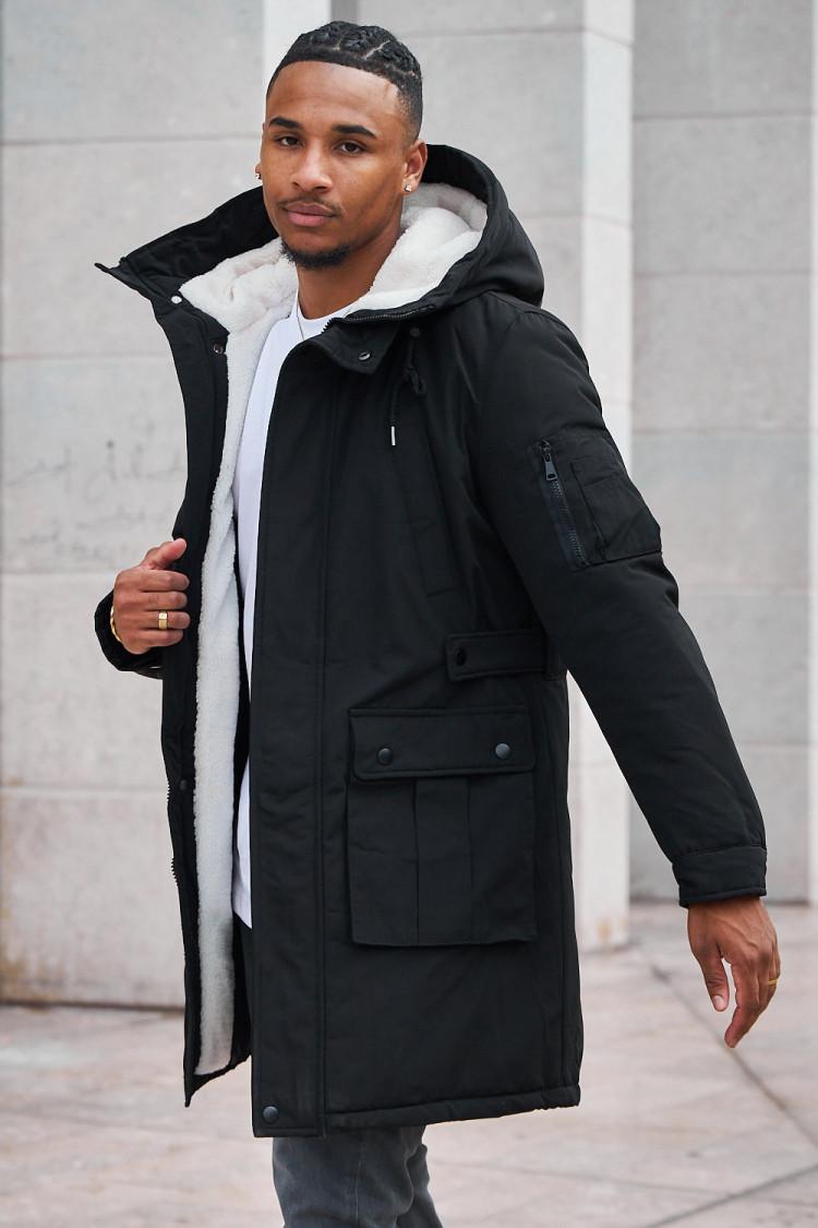 Parka noire à capuche longue à poches