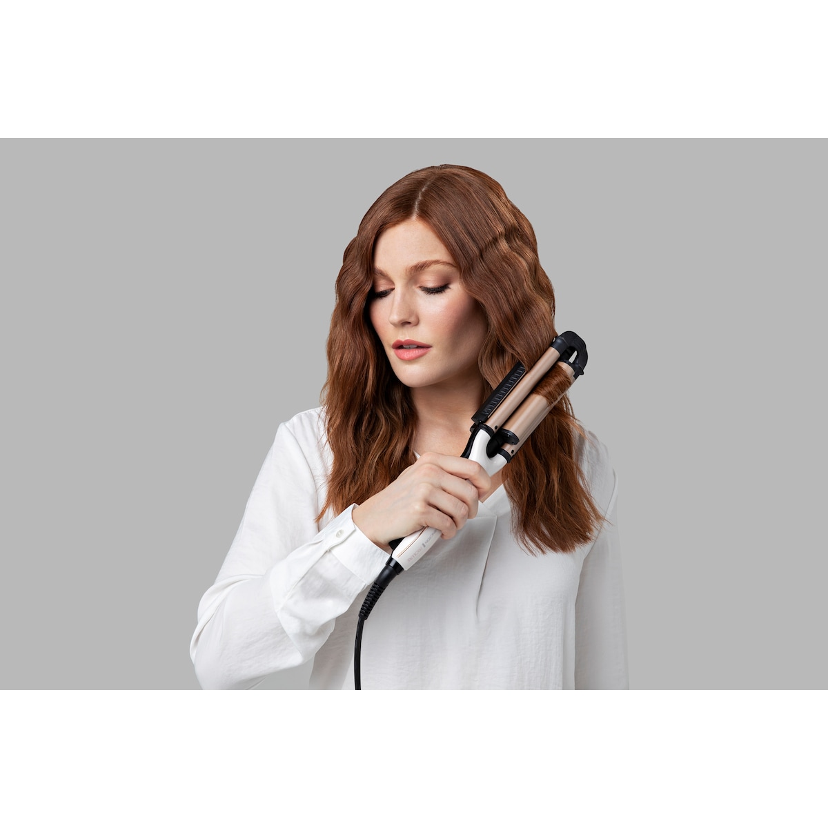 Remington PROLuxe 4-i-1 justerbar krølltang CI91AW