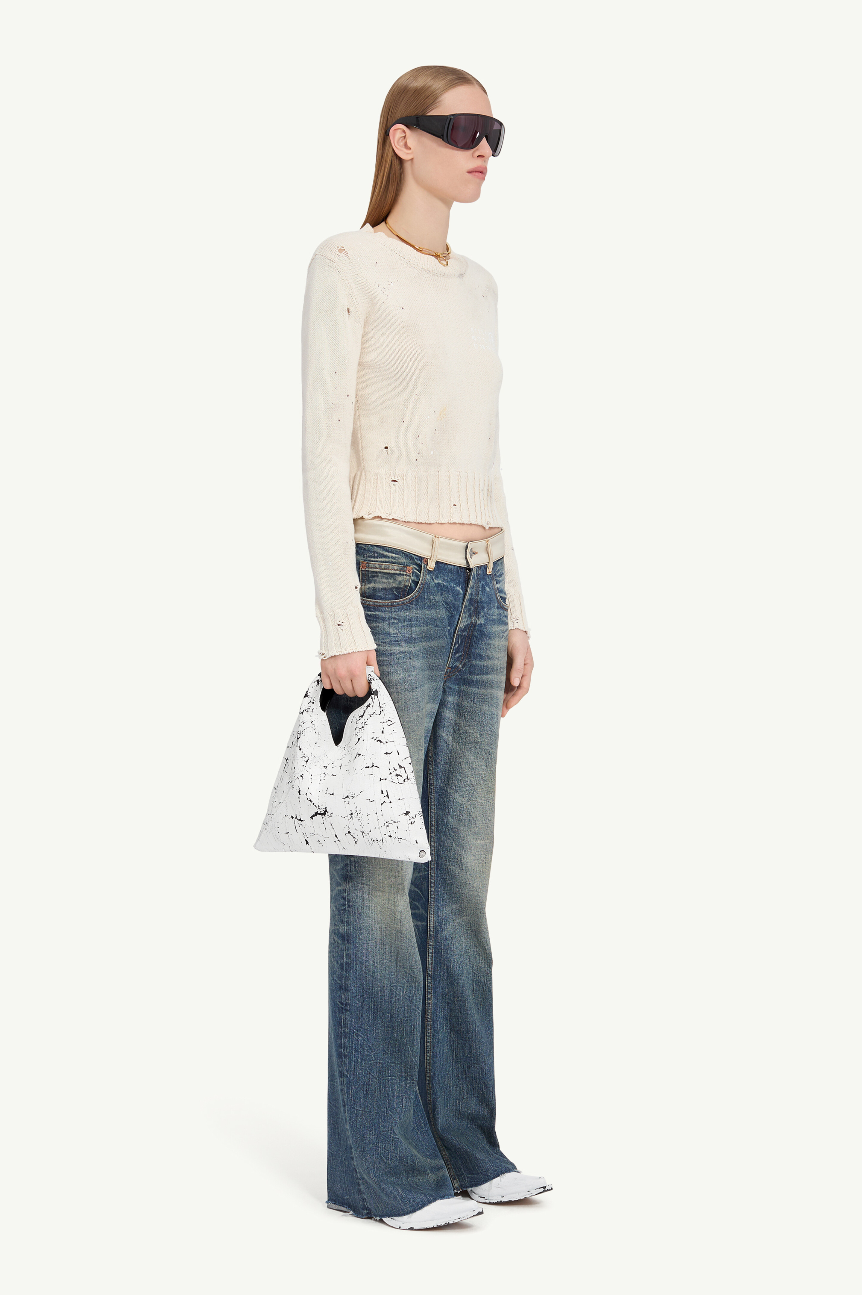 Pull en maille à résidus de peinture