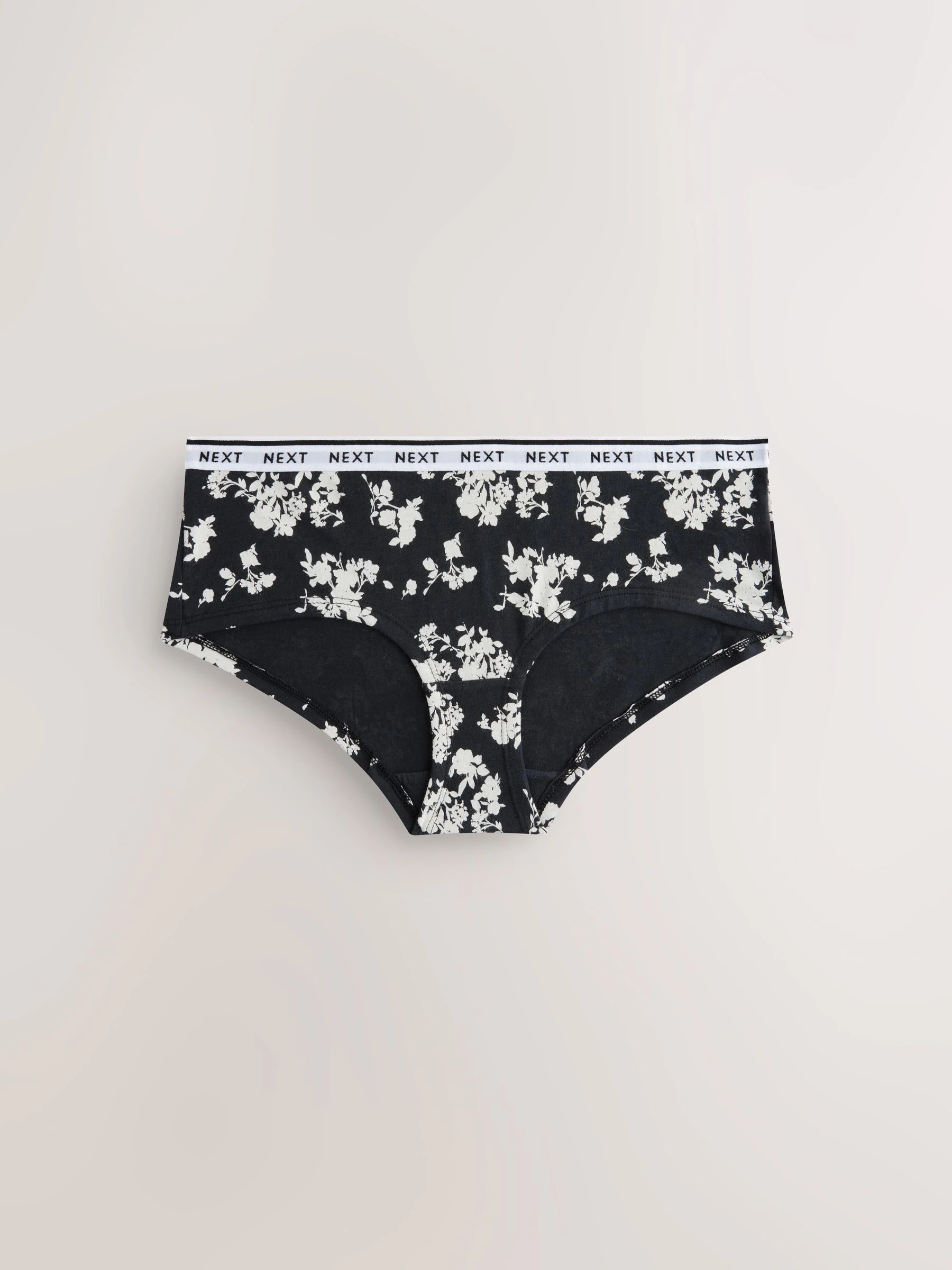 Zwart/wit met bloemenprint - 4 Katoenen slipjes met logotailleband