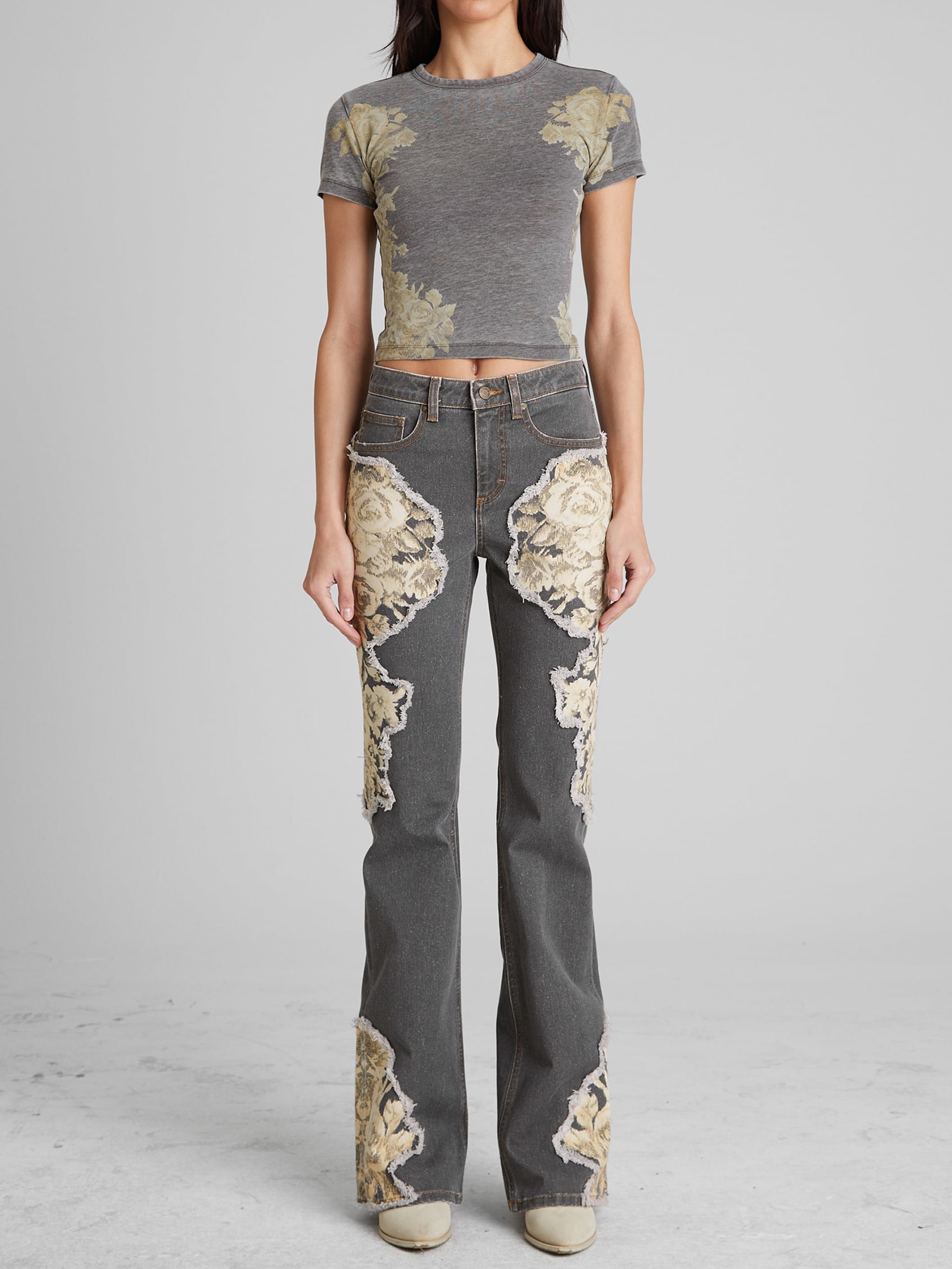 Calça jeans flare estampada