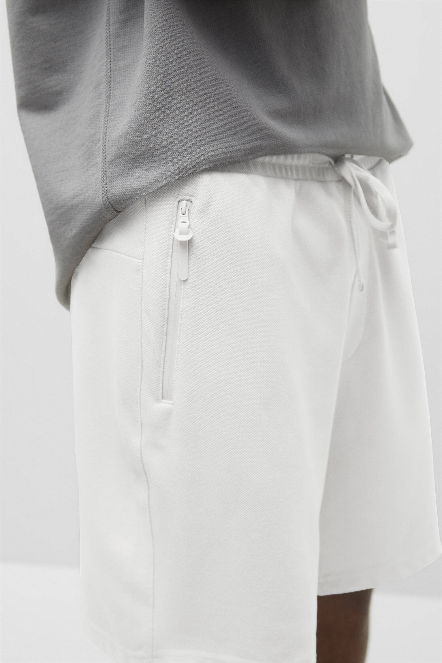 BERMUDA JOGGER TREINO PIQUÉ - BRANCO