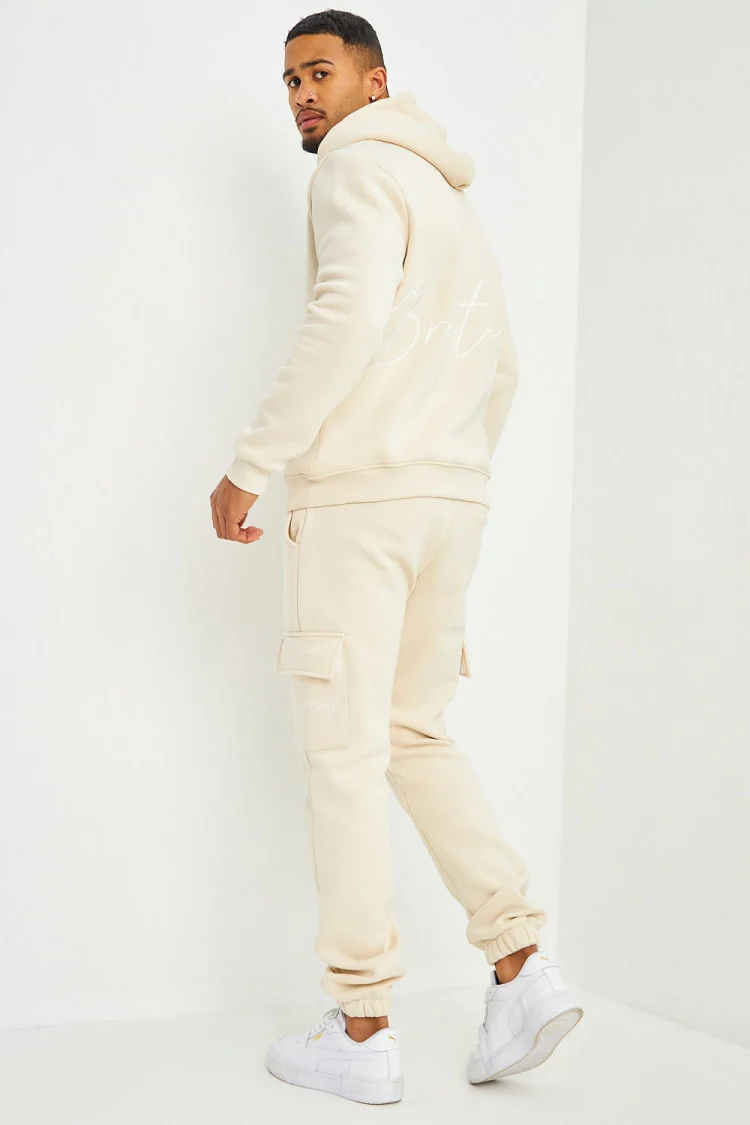 Pantalon de jogging beige clair poches cargo inscription Brentiny