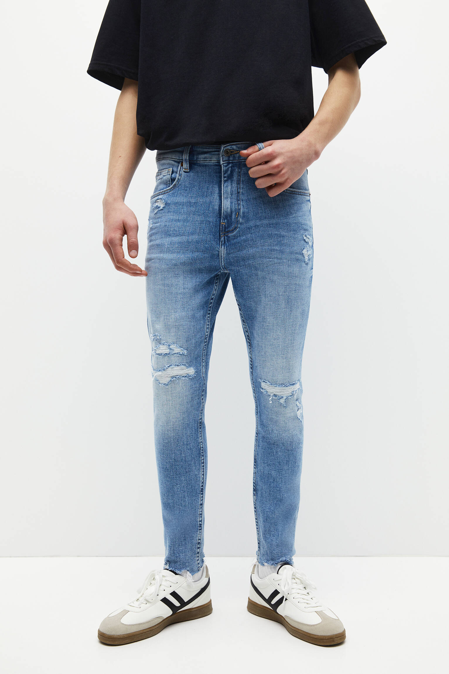 CALÇA JEANS SKINNY RASGADA - ÍNDIGO CLARO