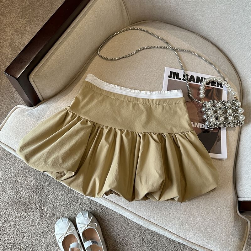 Bolgivy - Hoge taille rok met contrasterende rand en strikborduursel