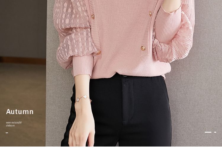 Meatacci - Gebreide top met pofmouwen en een mockneck, effen gestreept paneel