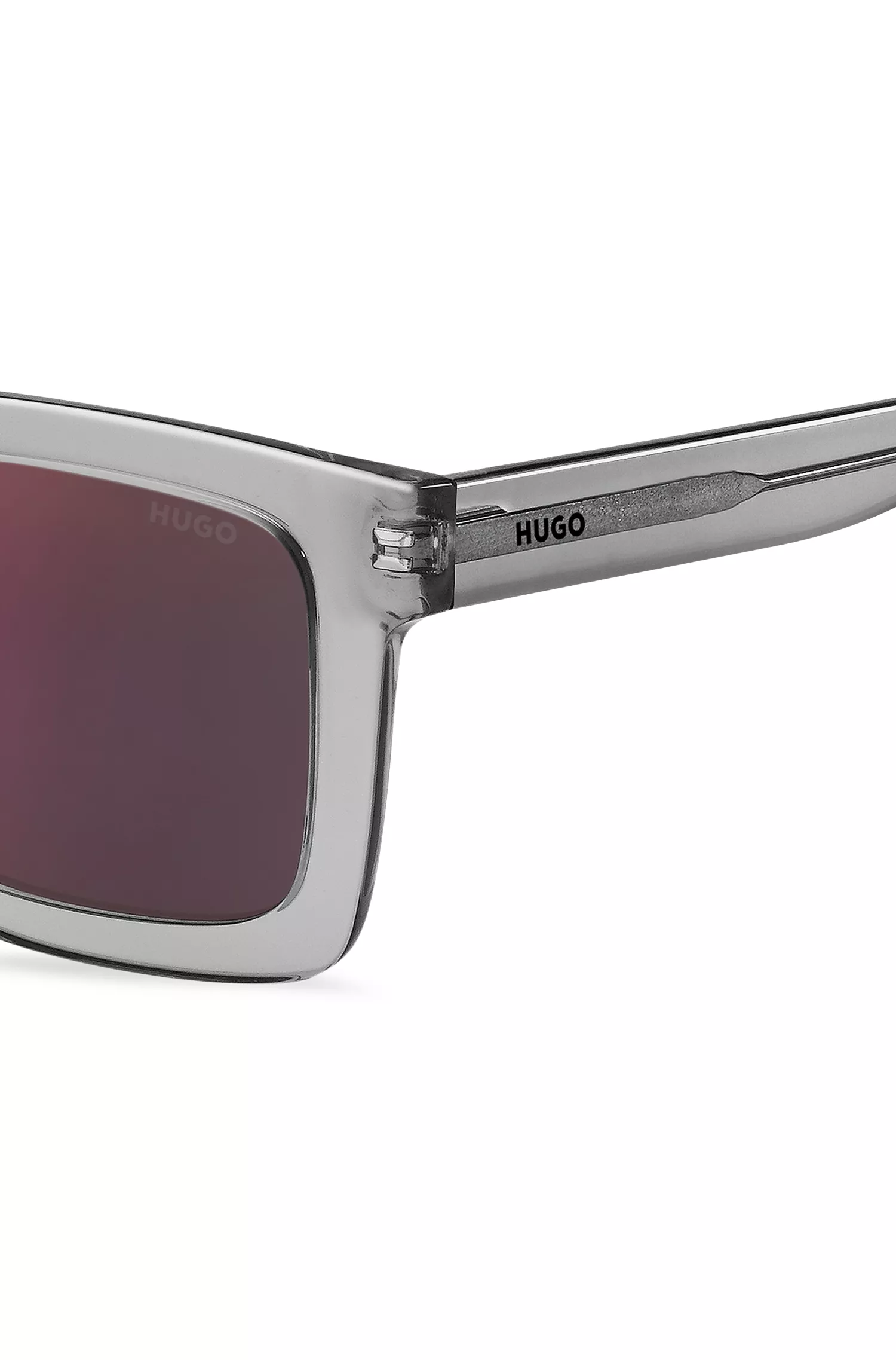Óculos de sol HUGO em acetato transparente vermelho com lentes vermelhas.