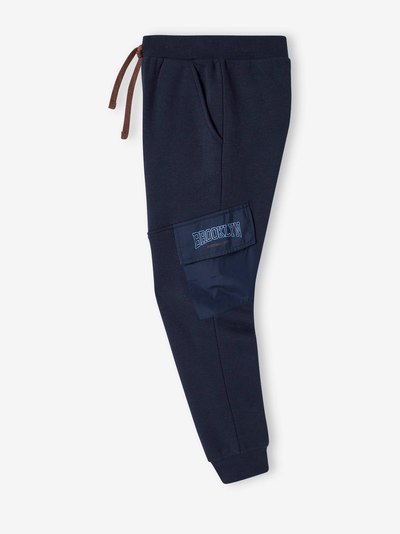 Calça de fato de treino infantil azul-escuro com bolsos de aba.