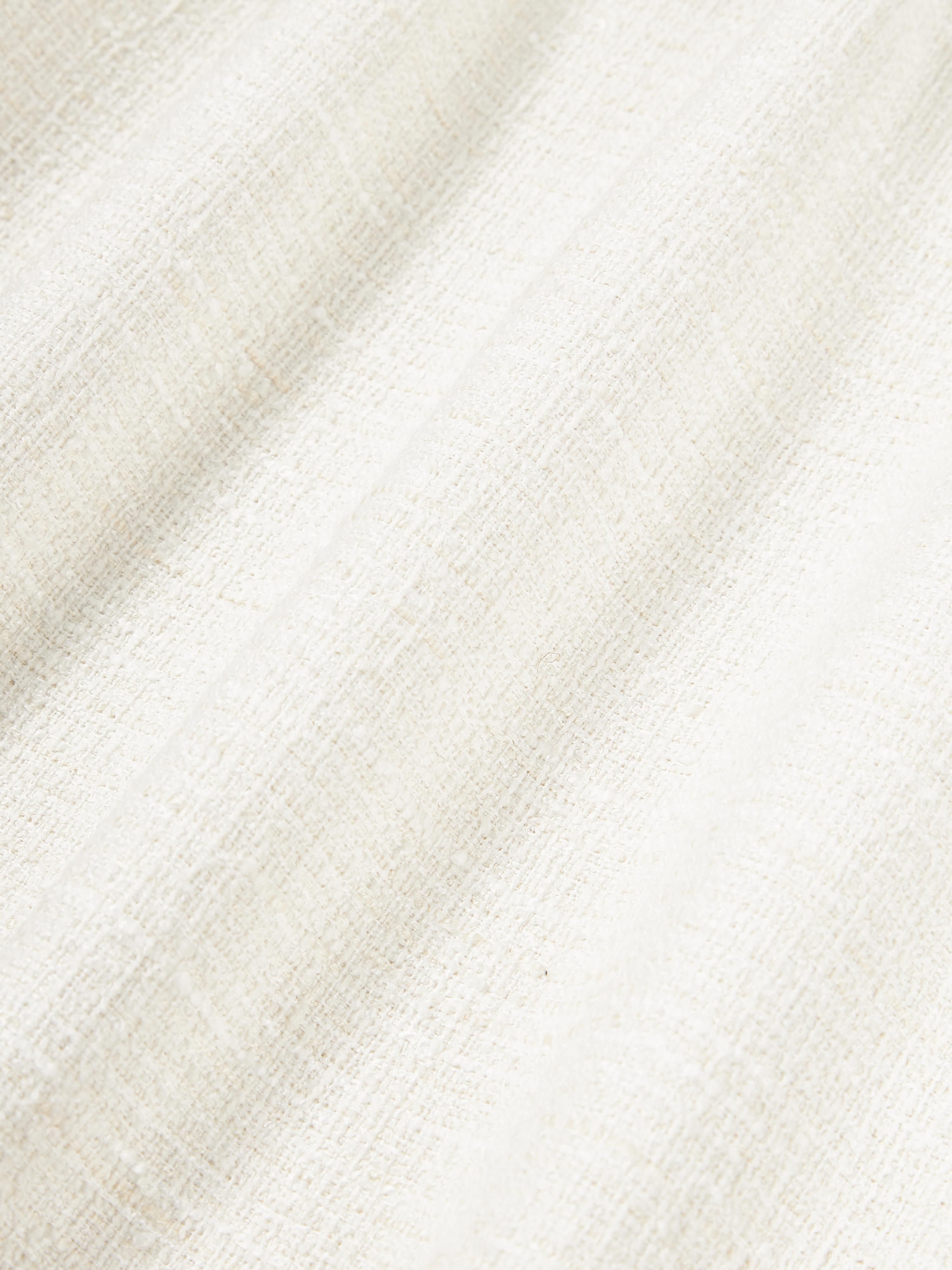 Bouclé kussenhoes Talea