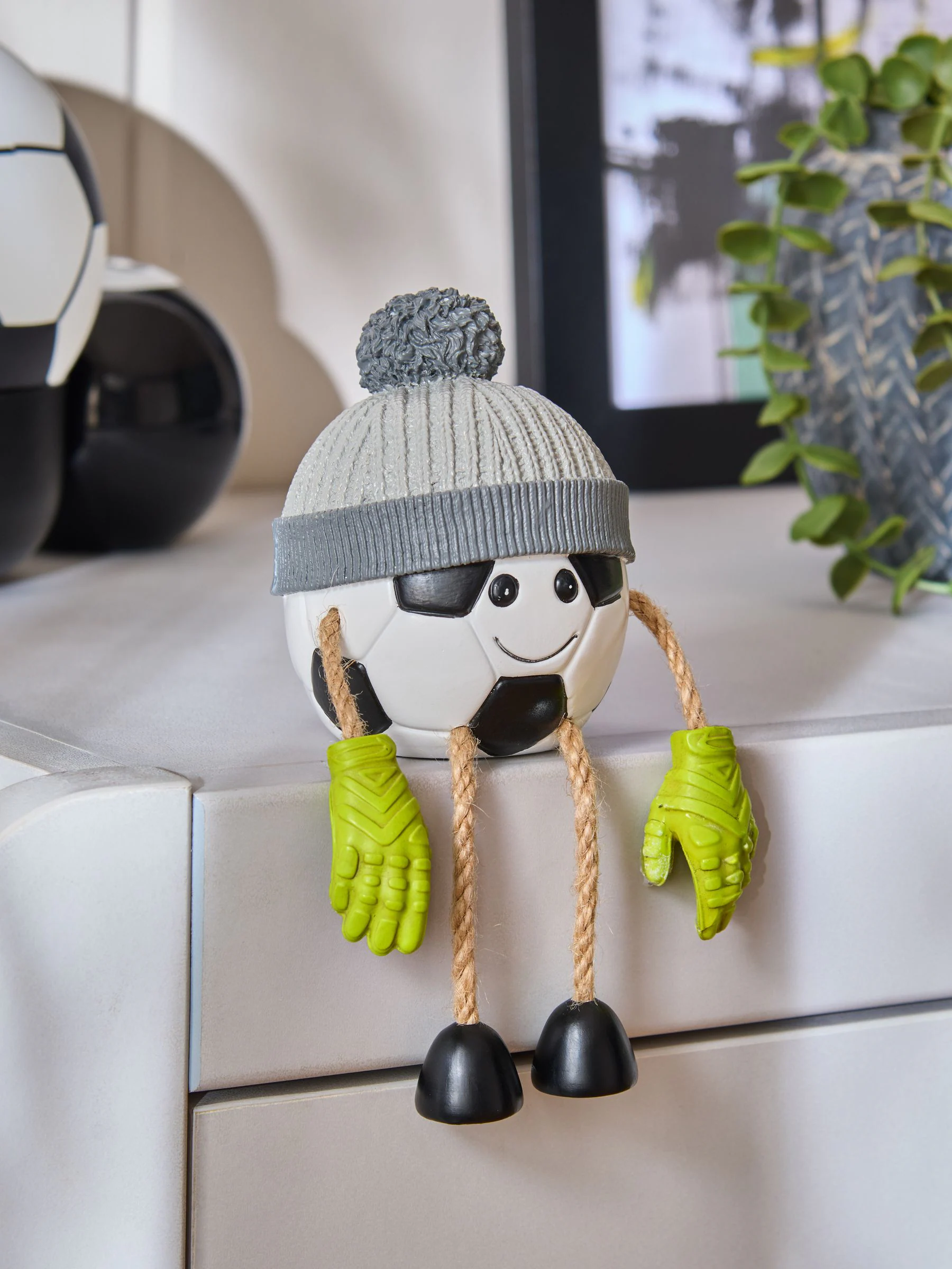 Decoratie met bungelende pootjes