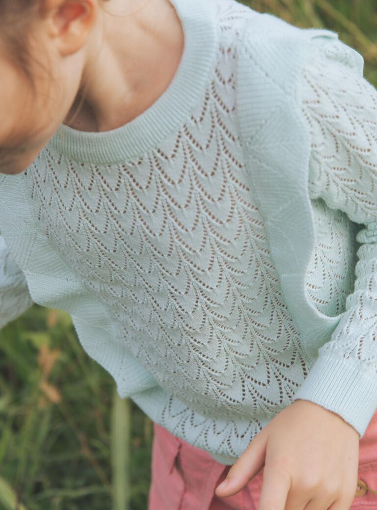 Pull bleu vert à volants