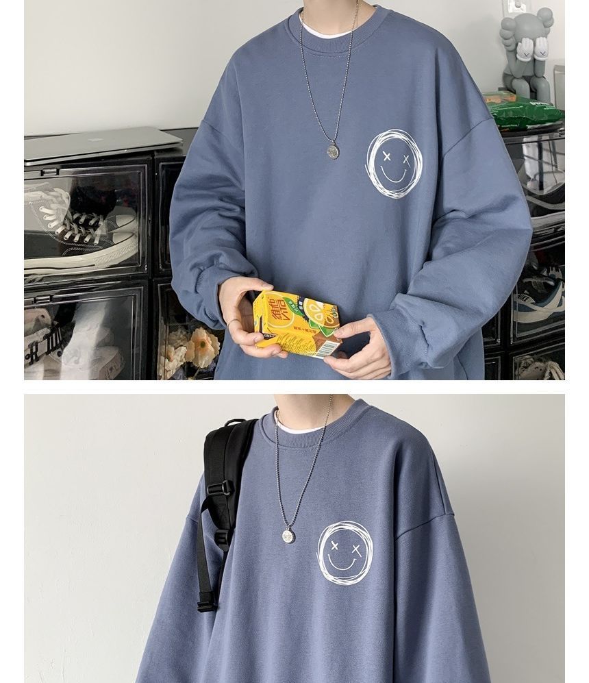 Sinlarity - Sweatshirt met ronde hals en smileyprint