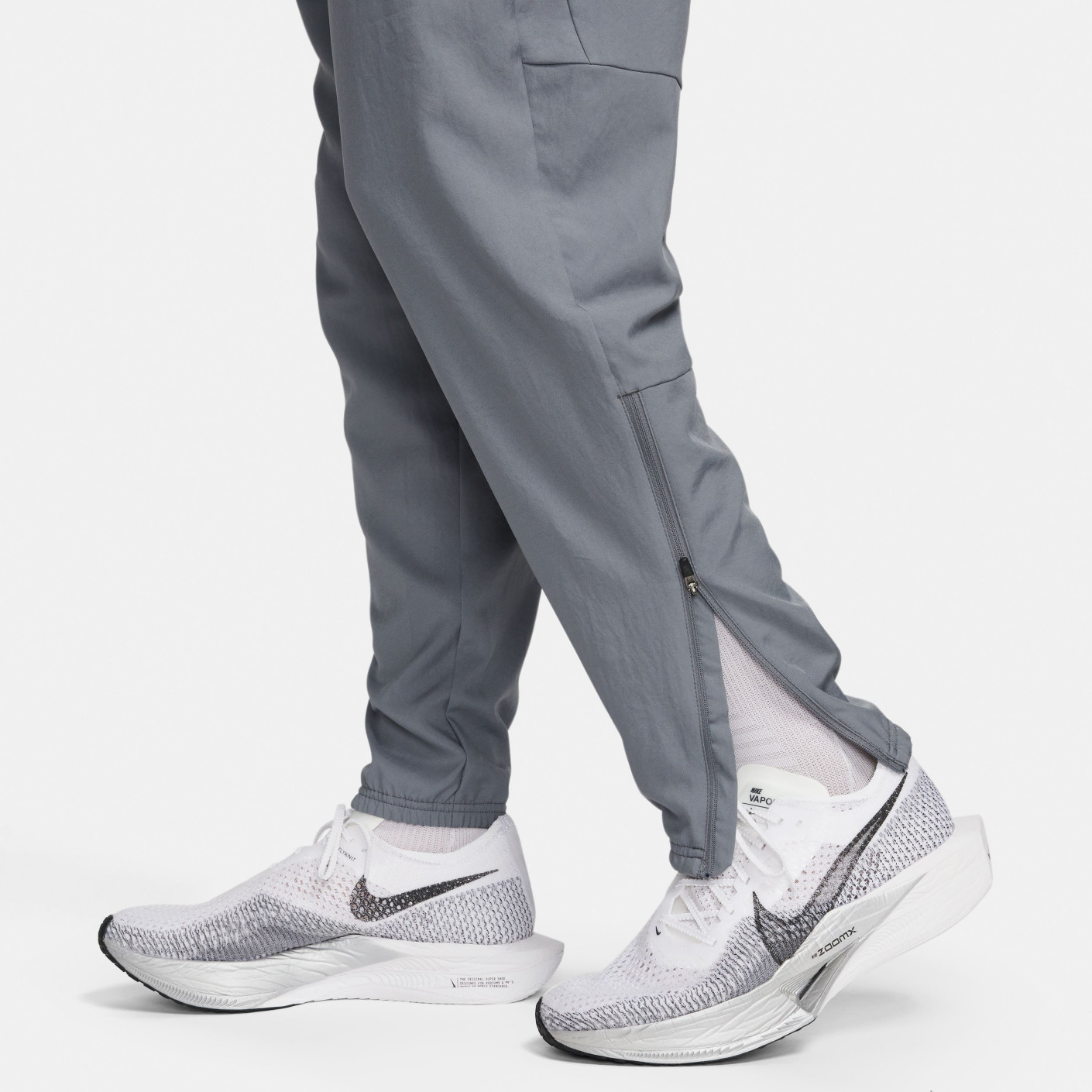 Nike Challenger Woven Trainingsbroek Grijsblauw Zwart Zilver
