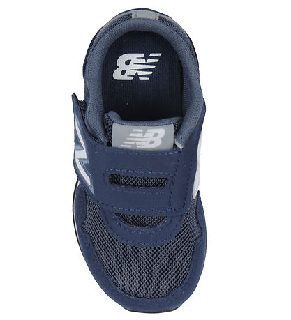 New Balance Schuhe - 323 - Navy/White