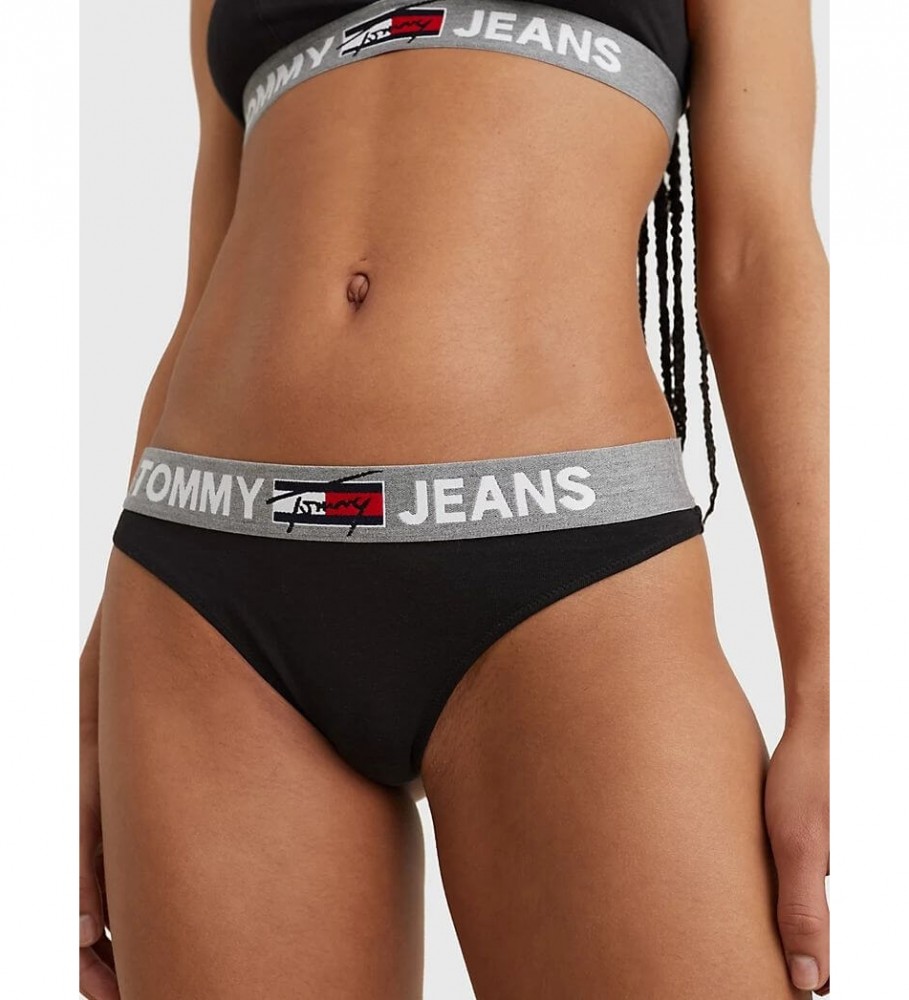 Calcinha fio dental Tommy Hilfiger com logo na cintura, preta.