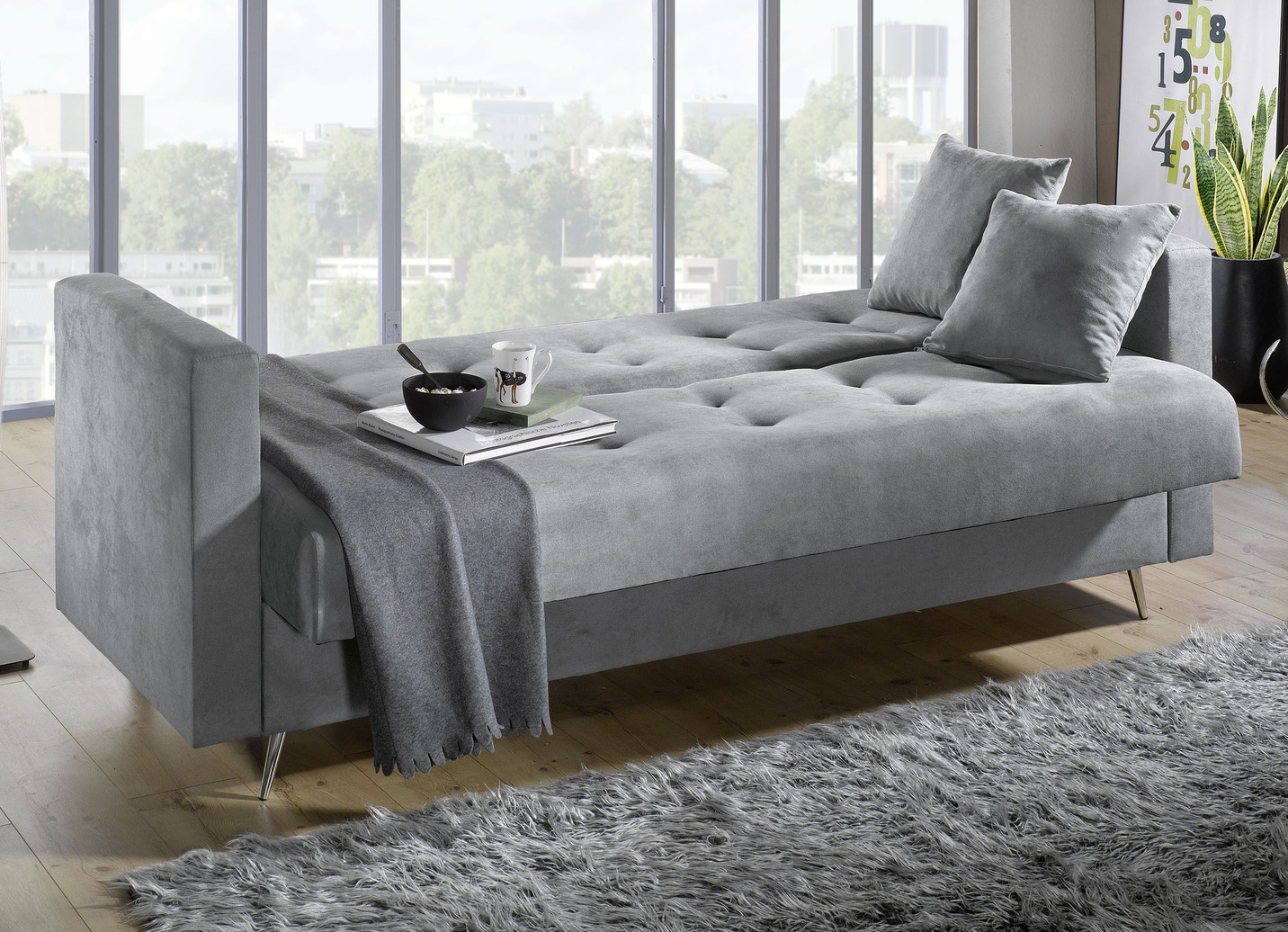 Schlafsofa auf Chromfüßen mit Bettkasten