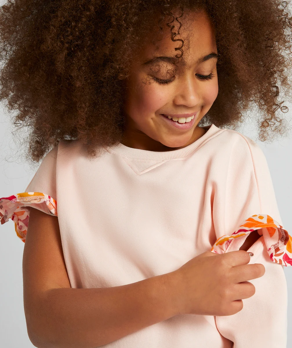 SWEAT ÉVOLUTIF FILLE ROSE EN FIBRES RECYCLÉES AVEC VOLANTS