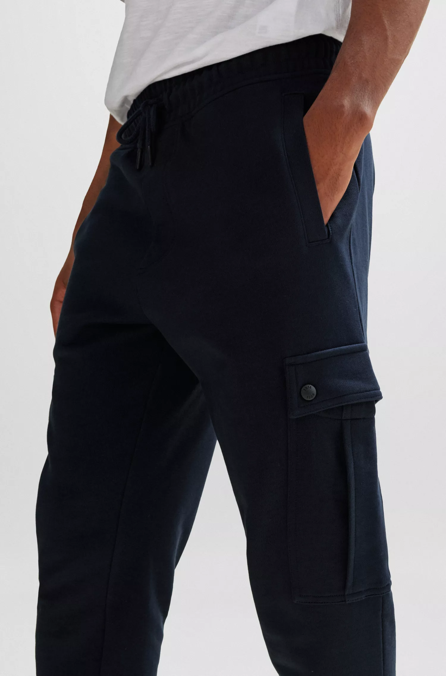 Calça de fato de treino BOSS em algodão felpudo laranja com bolsos cargo.