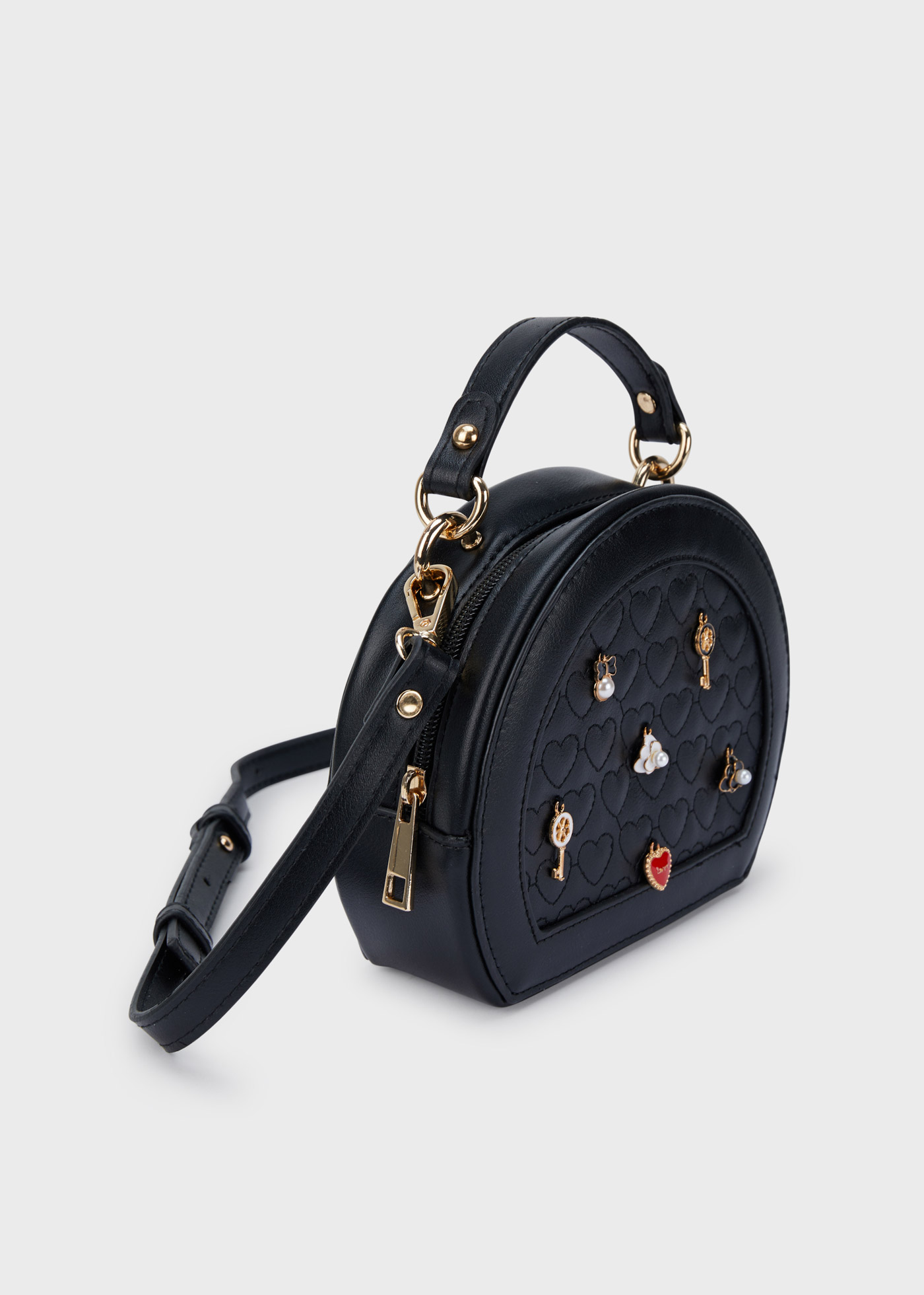 Bolsa com efeito acolchoado e detalhes decorativos para meninas