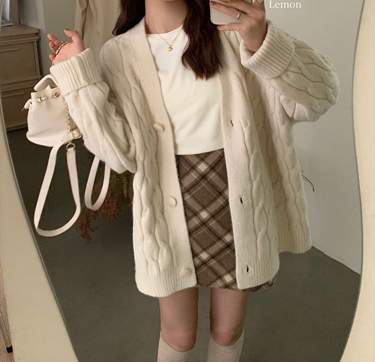 Doromynn - Oversized vest met V-hals en kabelmotief