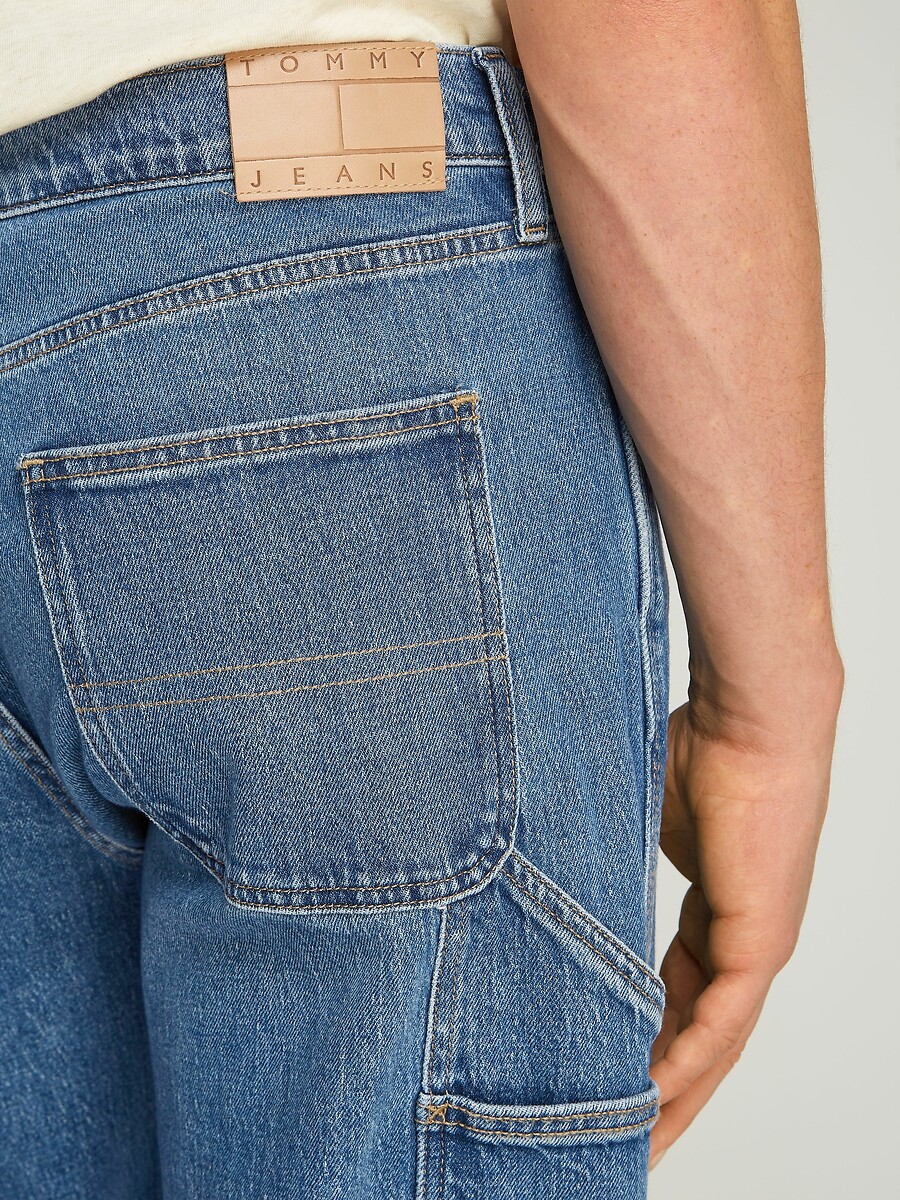 TOMMY JEANS<br>Calças jeans largas para carpinteiro Jaimie