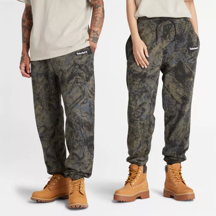 Calça de moletom unissex com estampa camuflada de montanhas.