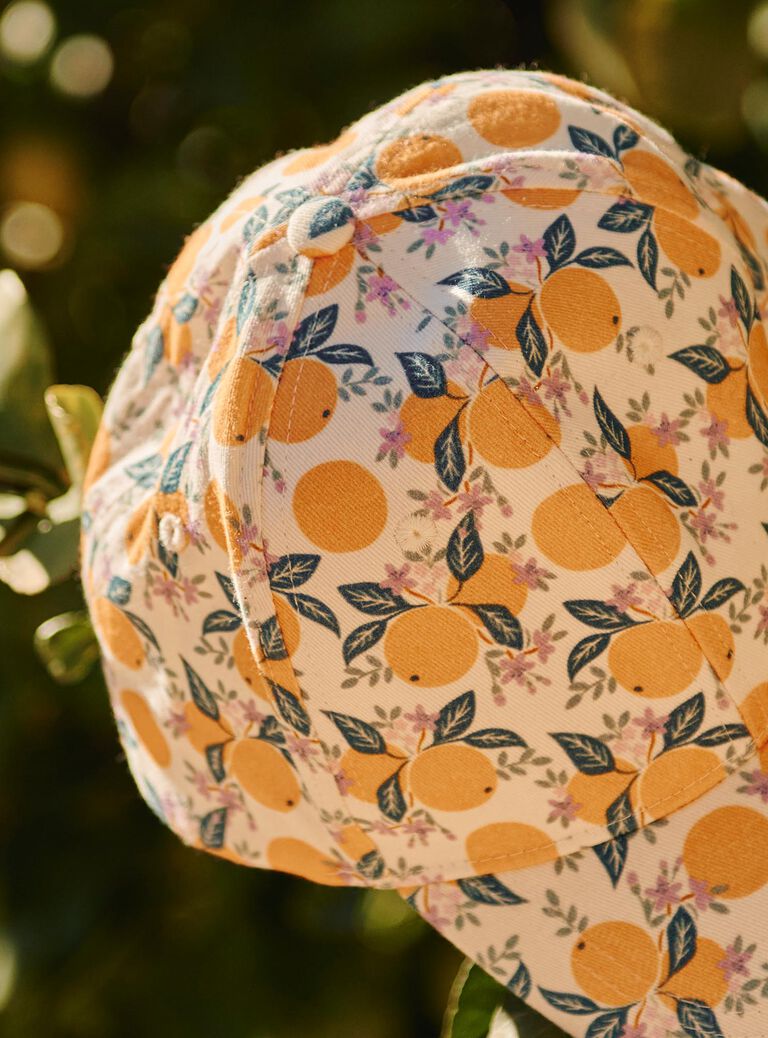 Casquette multicolore à motif clémentine