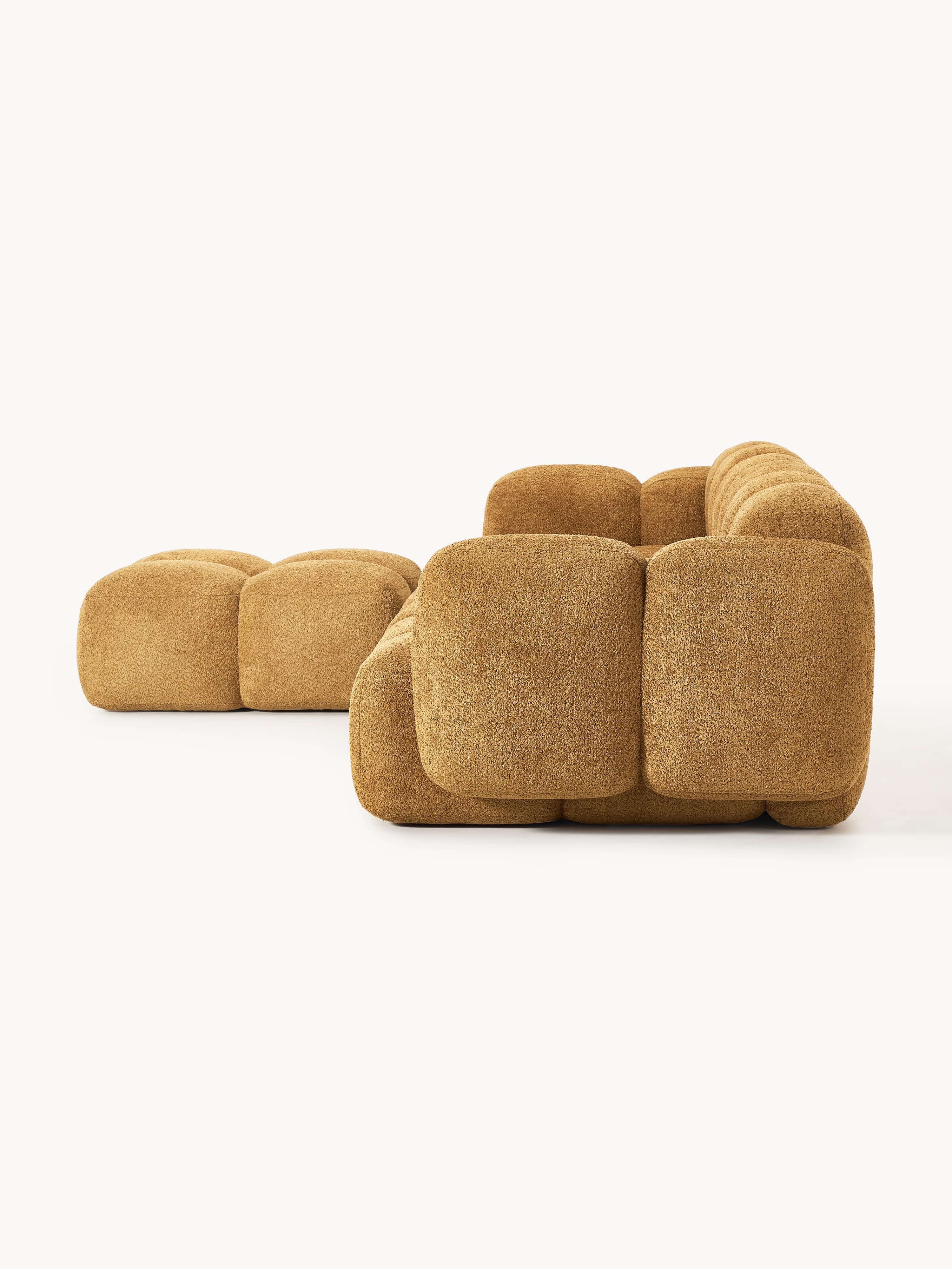 Modulaire bank Tayla (4-zits) van teddy bouclé met poef (links/rechts)