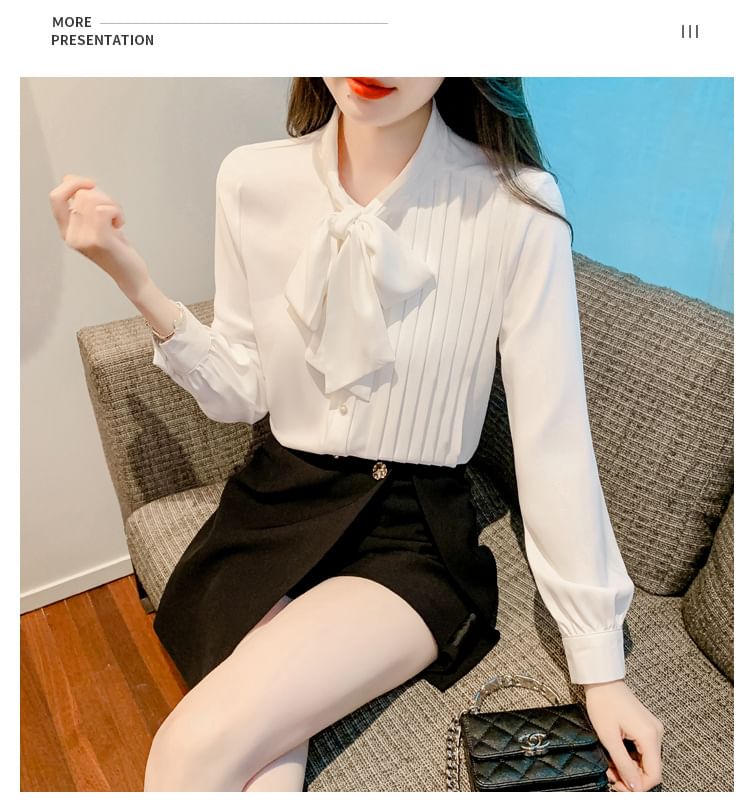 Yolandus - Blouse met lange mouwen, strikhals en asymmetrische plooien