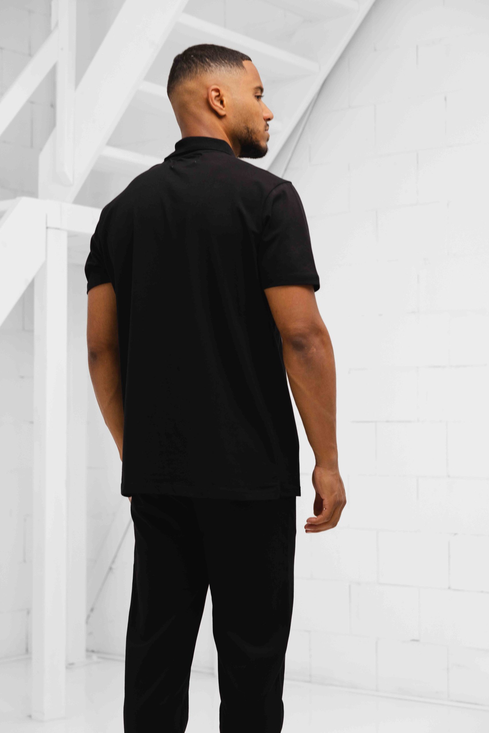 Pure Path Essential Triangle Polo Heren Zwart