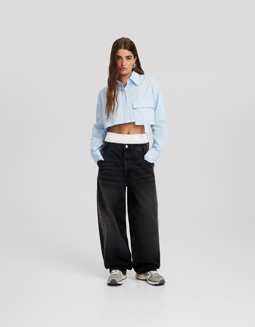 calça jeans estilo skater com efeito desbotado