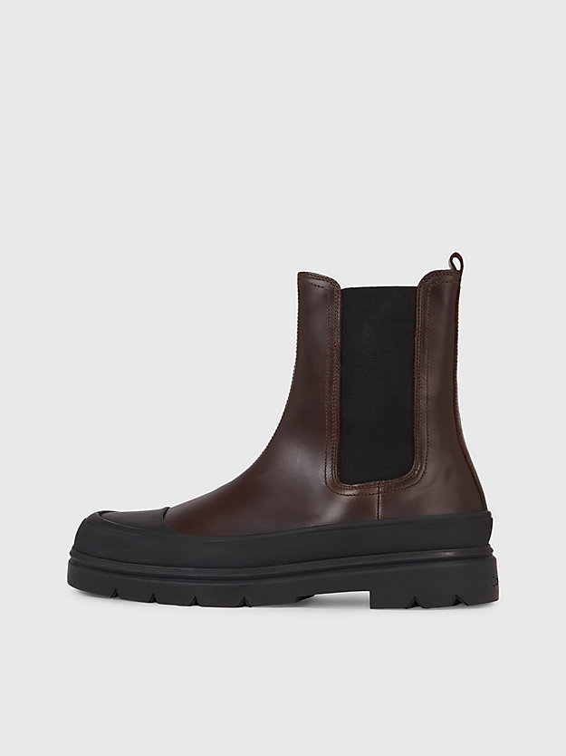botas de couro até o tornozelo