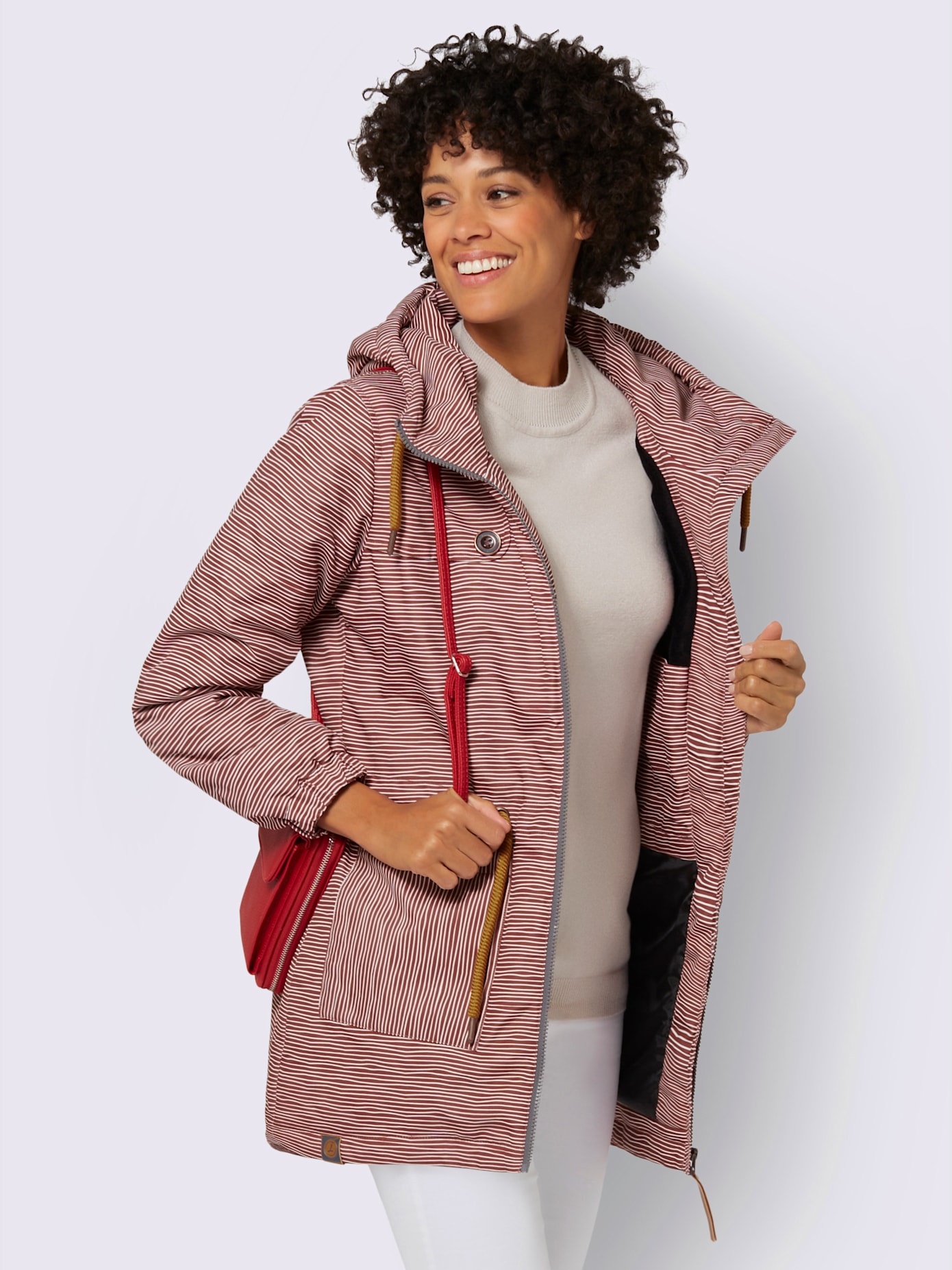Veste capuche avec coulisse et lien à nouer