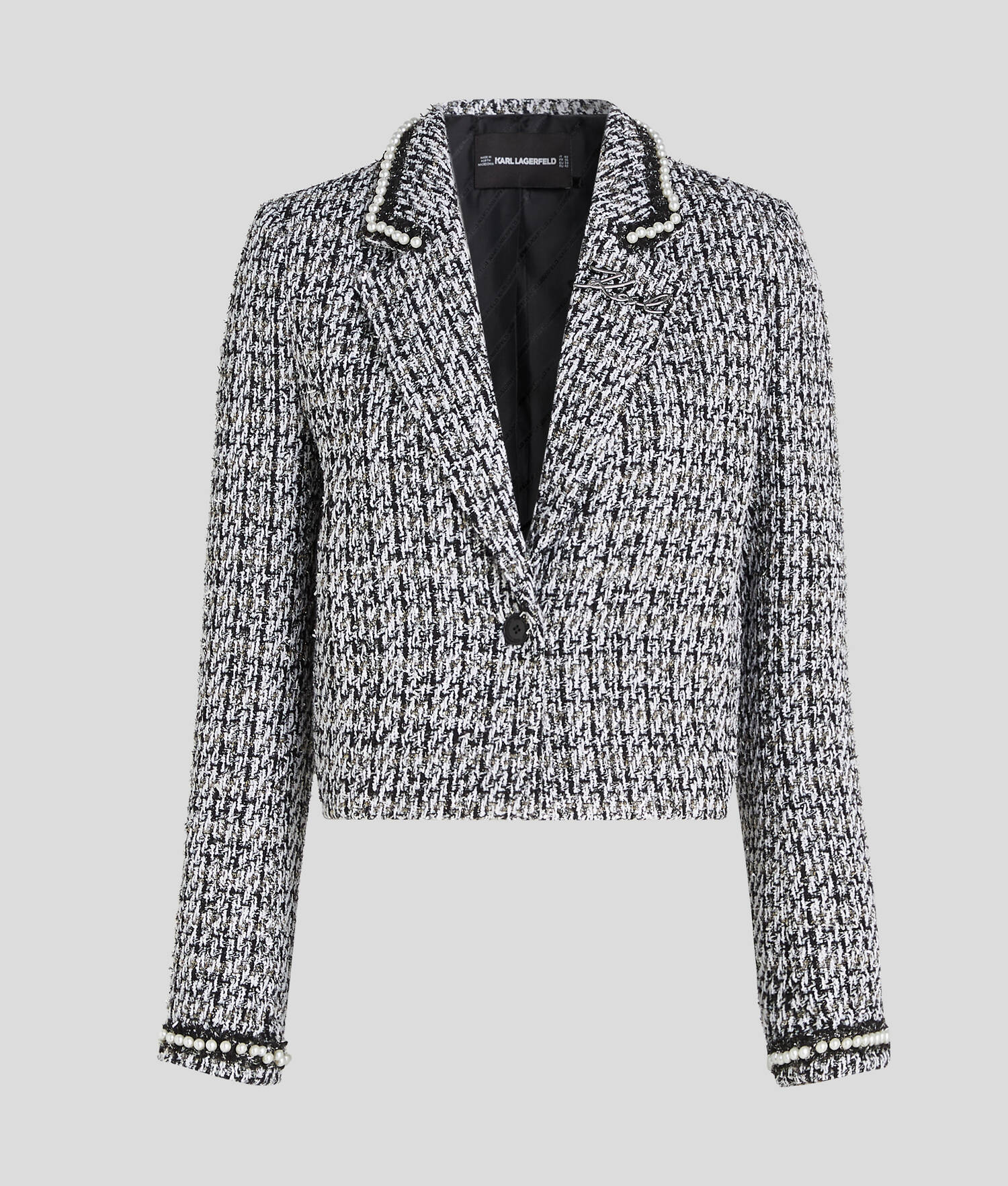 VESTE EN BOUCLÉ ORNÉE DE PERLES