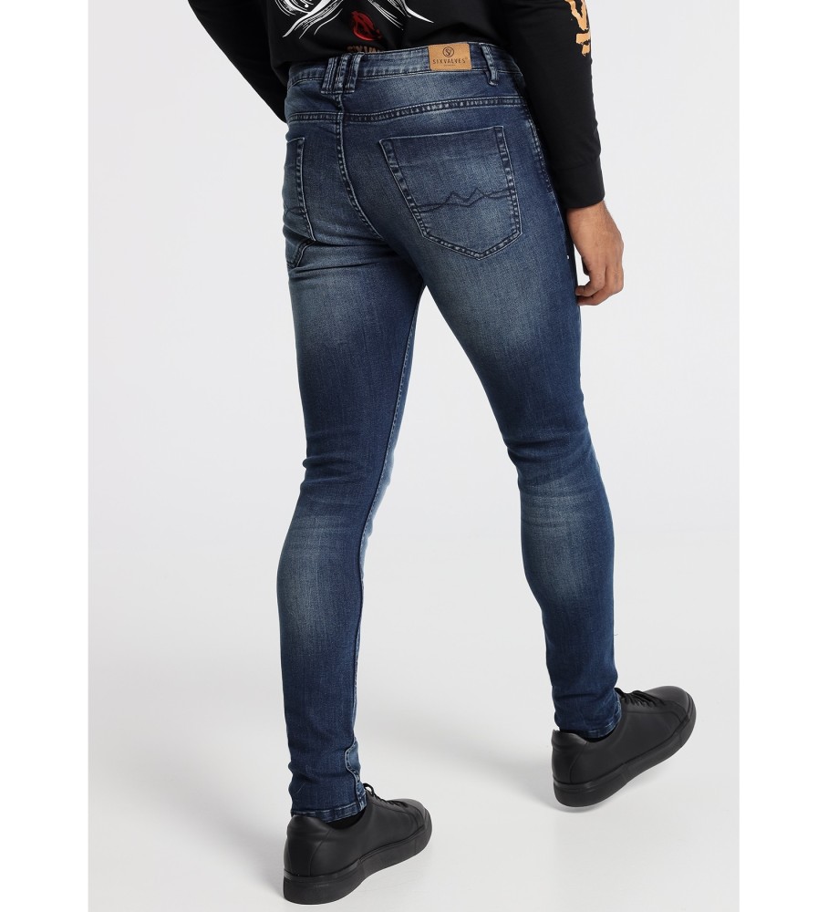 Calça jeans Six Valves, jeans azul escuro, skinny rasgada, cinza.