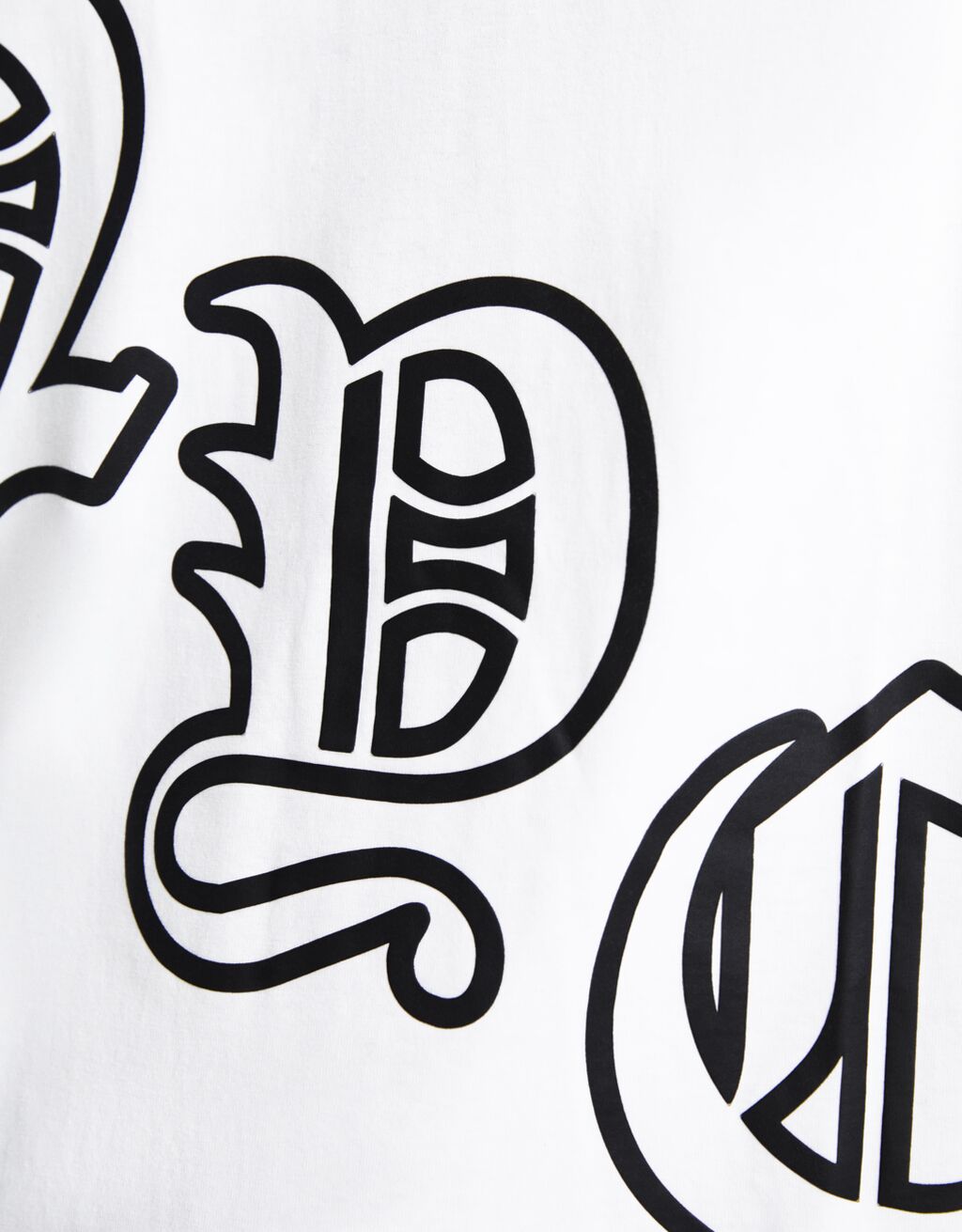 Camiseta oversized estampada com mangas 3/4