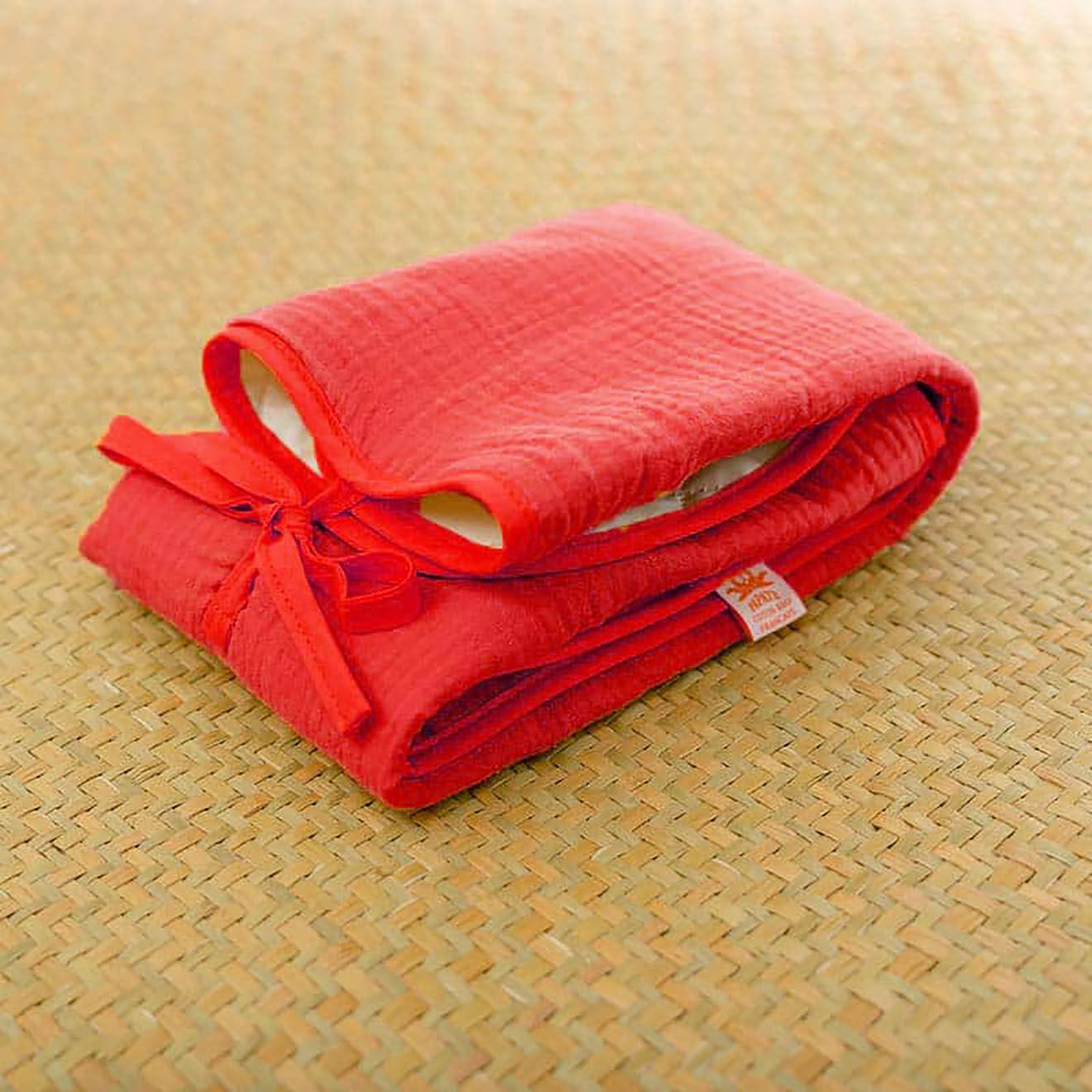 Papate Tapis à Langer Nomade en Coton Bio fraise - 65x42 cm