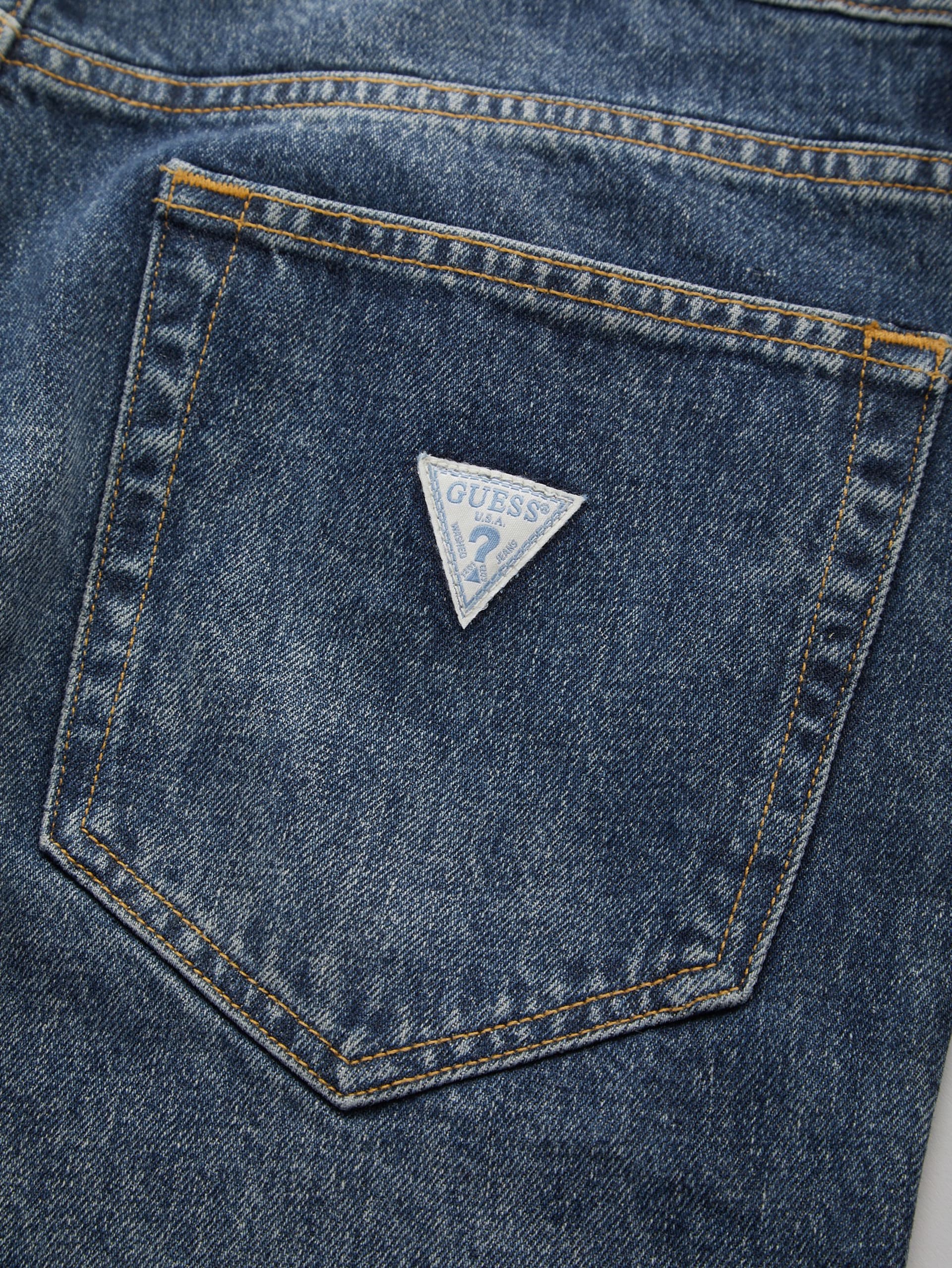calça jeans vintage de lavagem clara