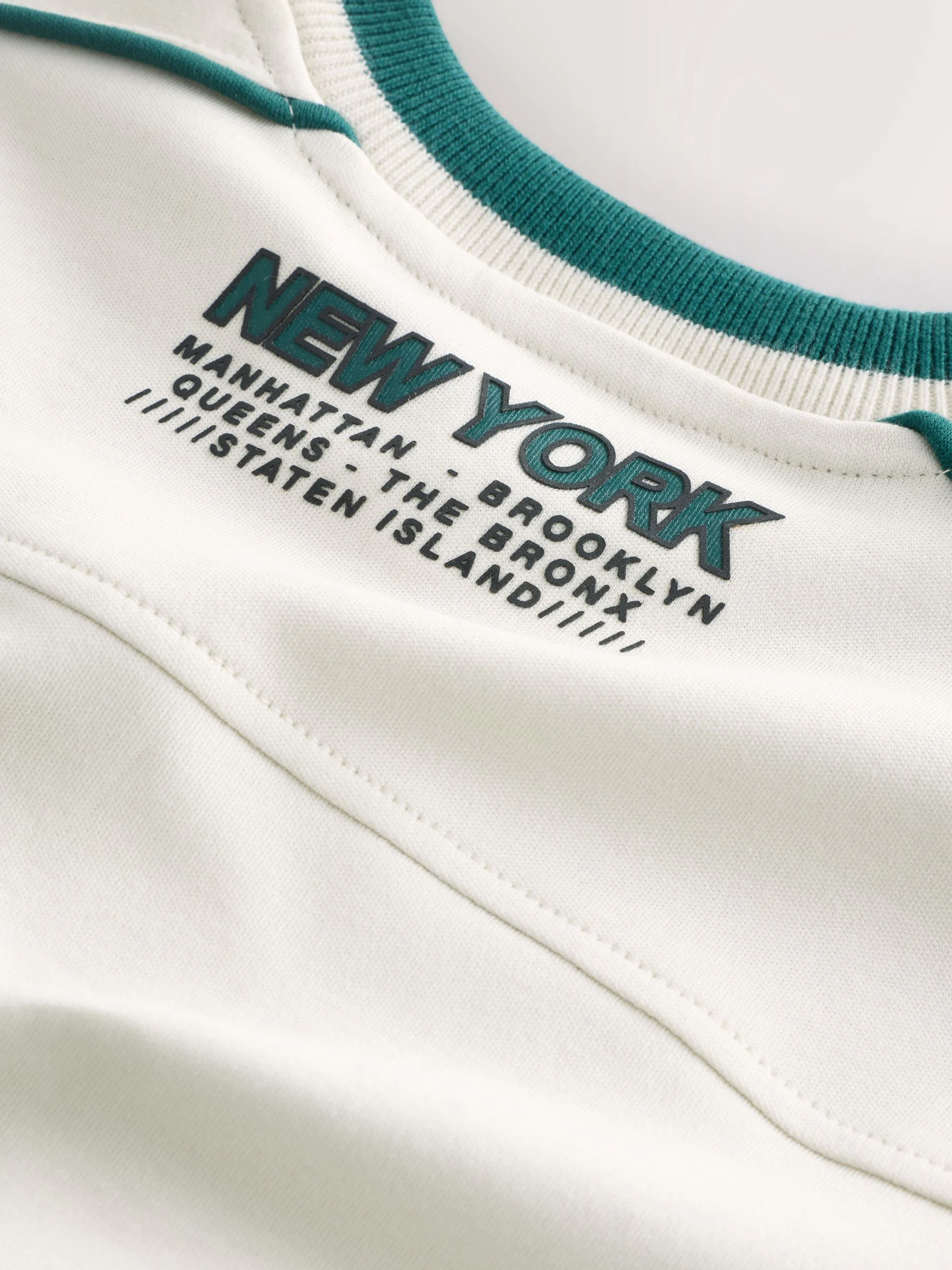 Ecru/groen - Varsity T-shirt met lange mouwen van katoen (3-16jr)