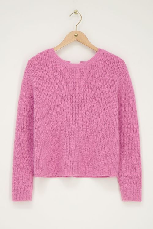 Roze gebreide trui met strikken