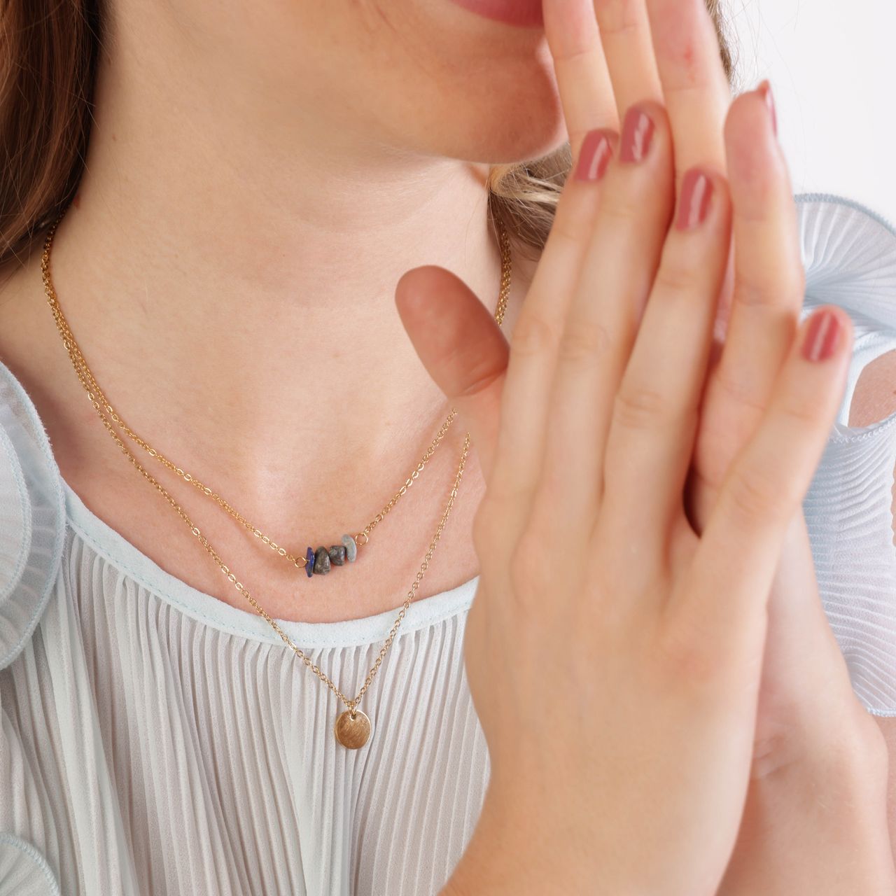Stalen goldplated ketting met muntje en lapis
