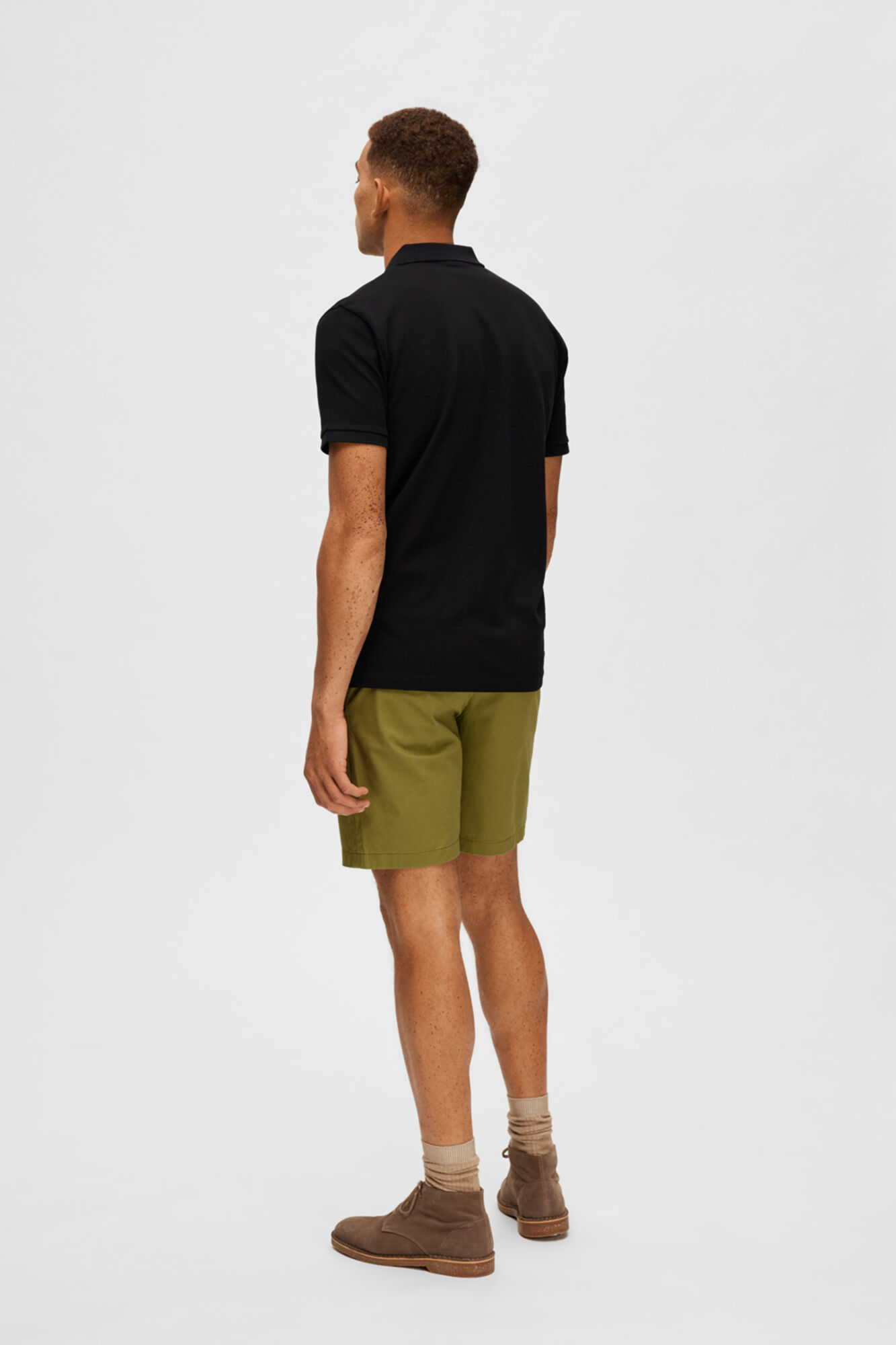 Camisa polo de manga curta com logo em destaque, 100% algodão orgânico - Preta