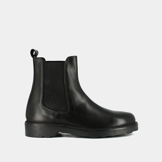 Boots à talons plats et bouts ronds  en cuir noir