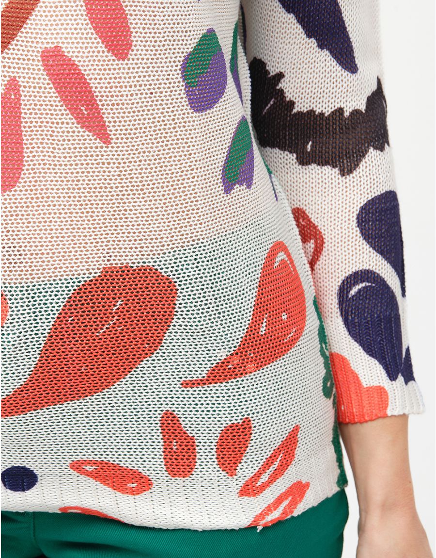 Pull blanc à motifs